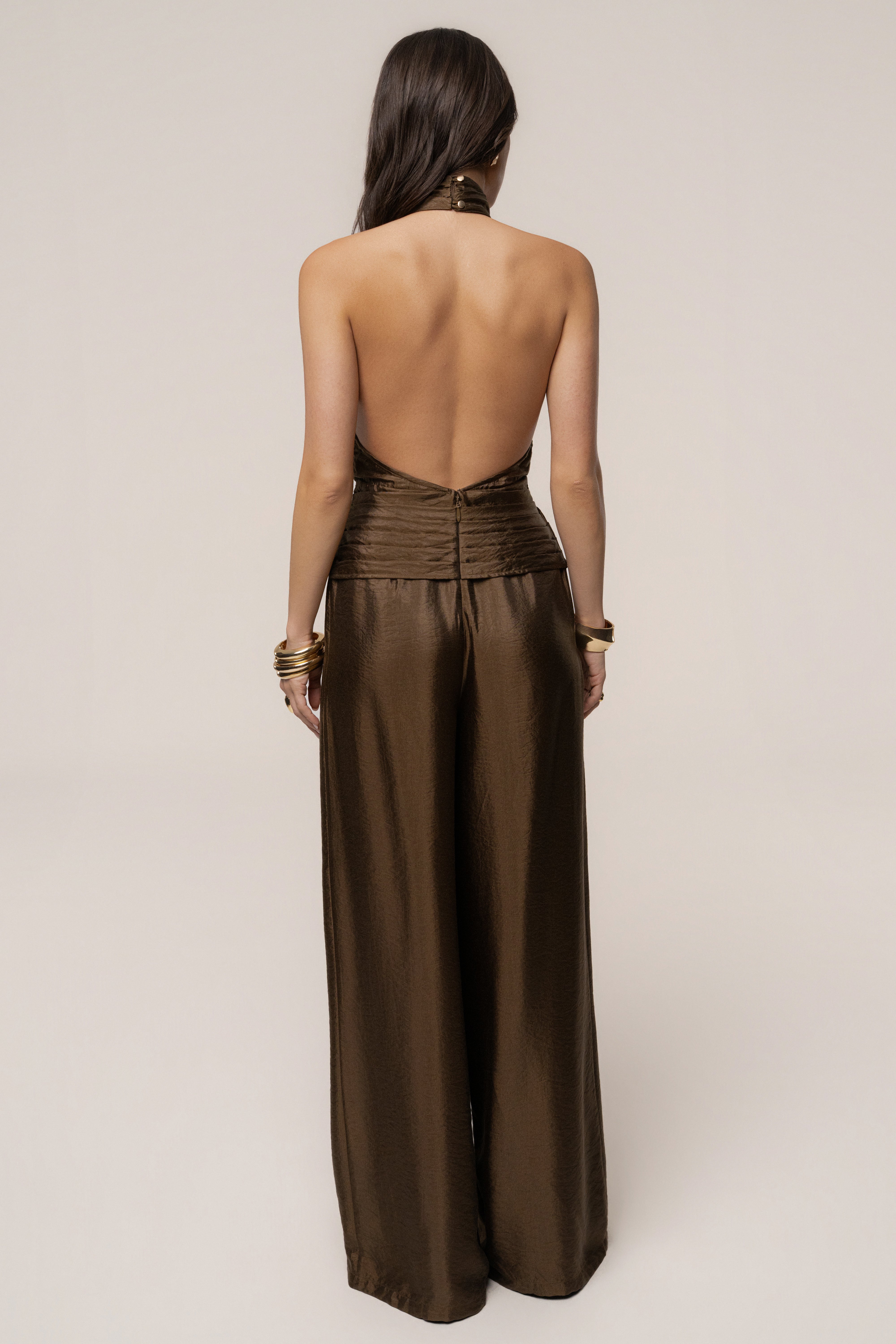 Olive green JLUXLABEL jumpsuit with accent details, sleeveless design, and wide-leg style, ideal for casual or stylish occasions.