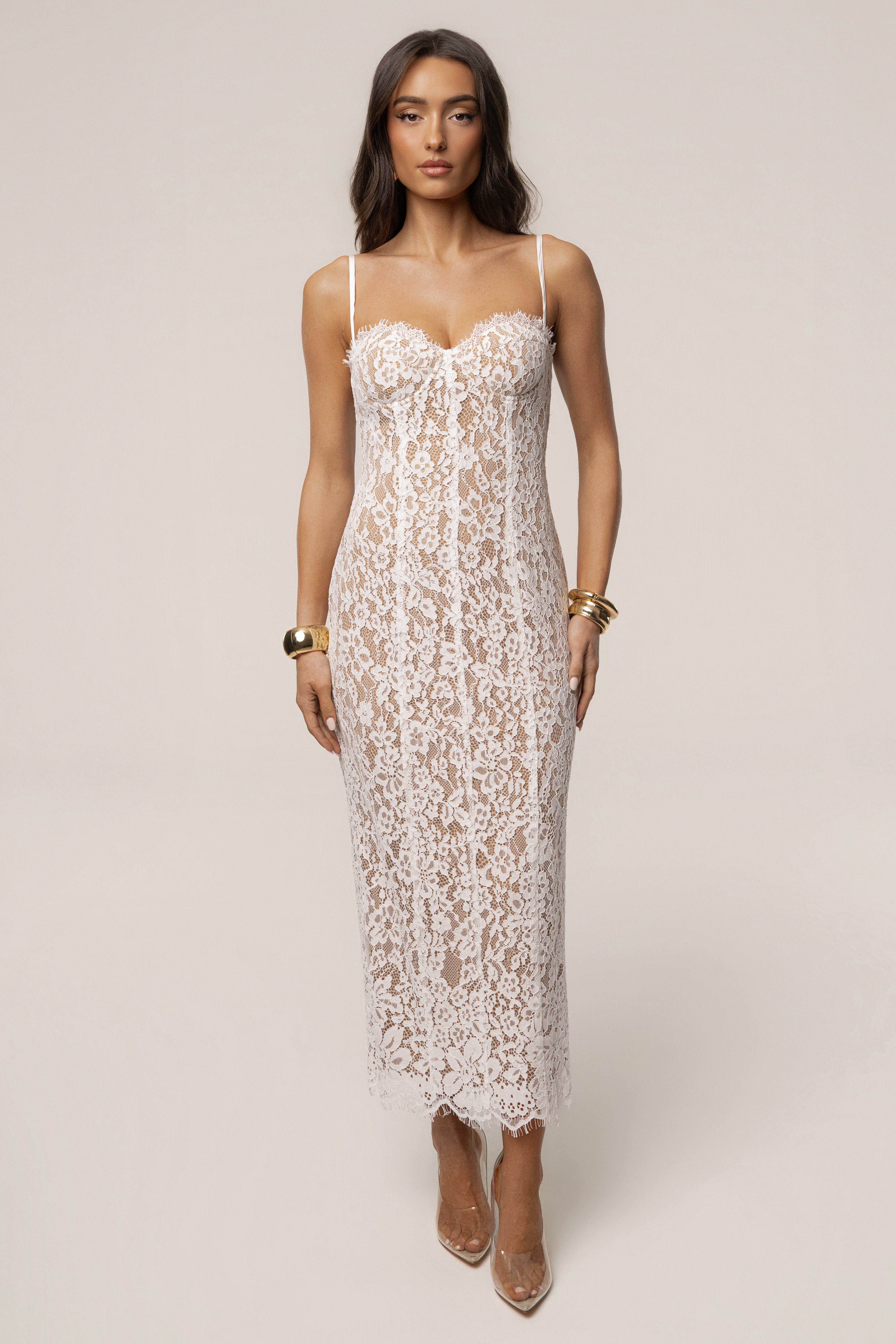 White Love Reign Lace Midi Dress by JLUXLABEL, elegant sleeveless dress with intricate lace detailing and a fitted silhouette.
