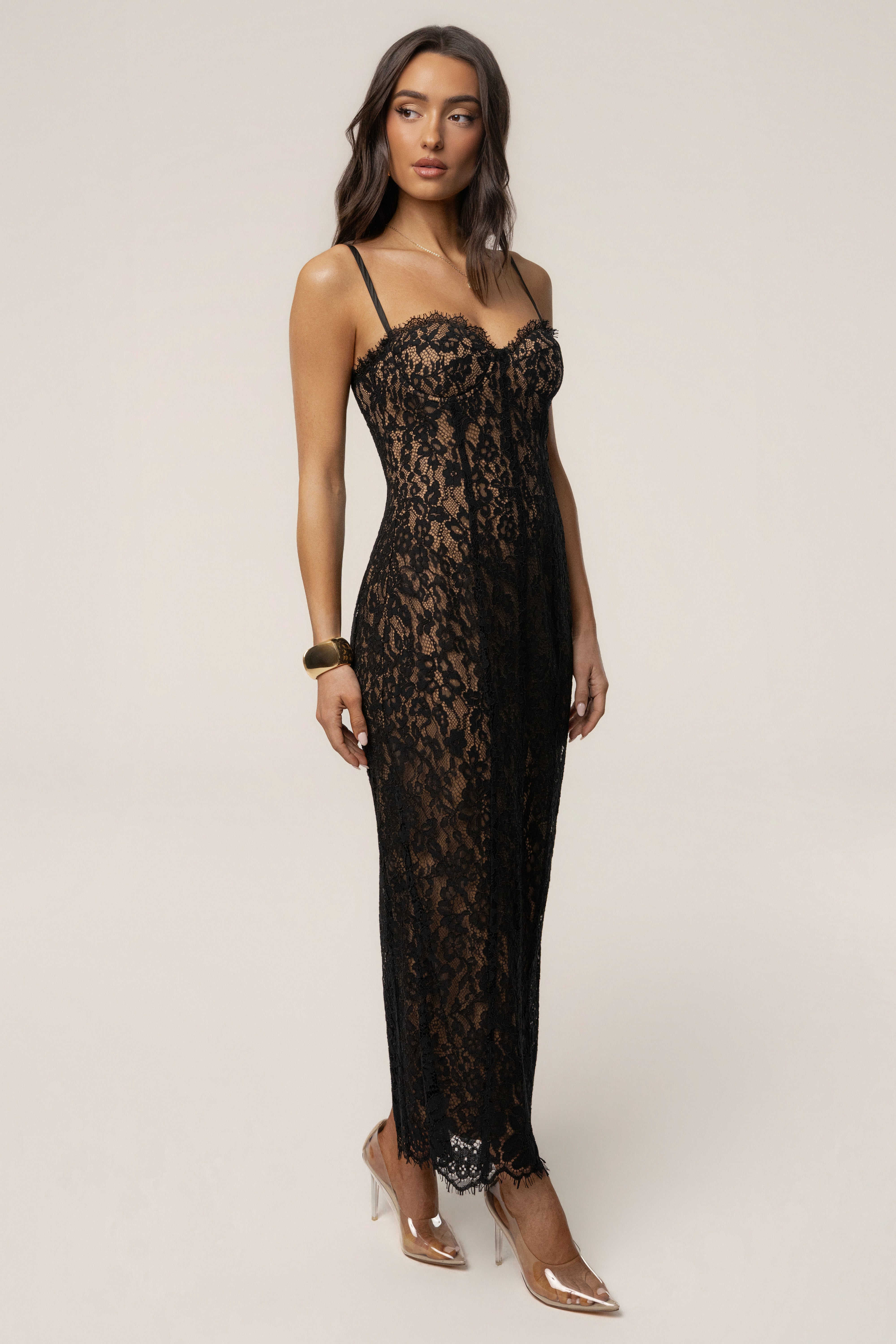 Black Love Reign Lace Midi Dress by JLUXLABEL, featuring intricate lace details and a fitted silhouette, displayed on a model.