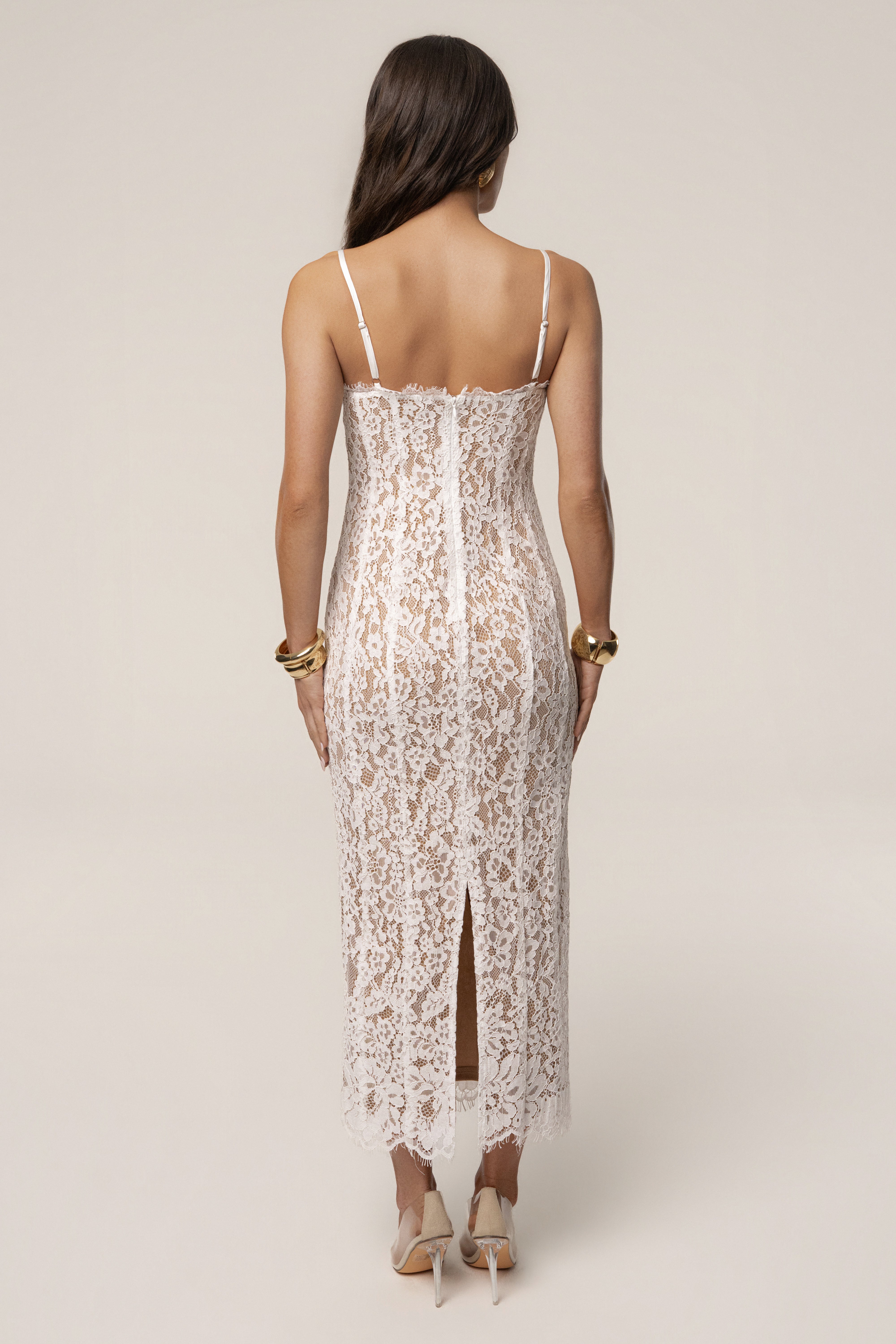 White Love Reign Lace Midi Dress by JLUXLABEL, featuring intricate lace details and a flattering midi length silhouette.