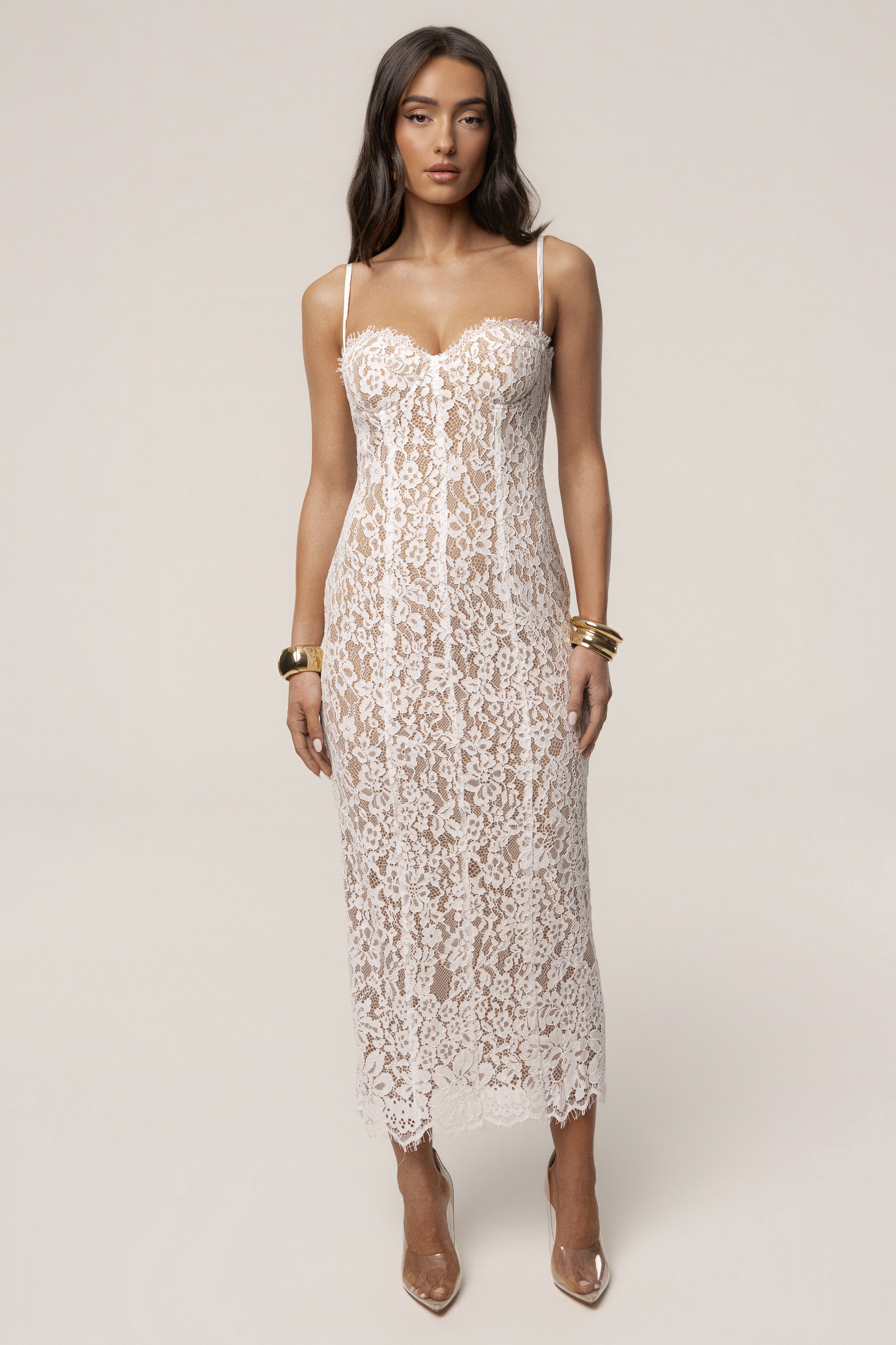 White Love Reign lace midi dress by JLUXLABEL, featuring intricate lace details and a fitted silhouette, perfect for elegant occasions.