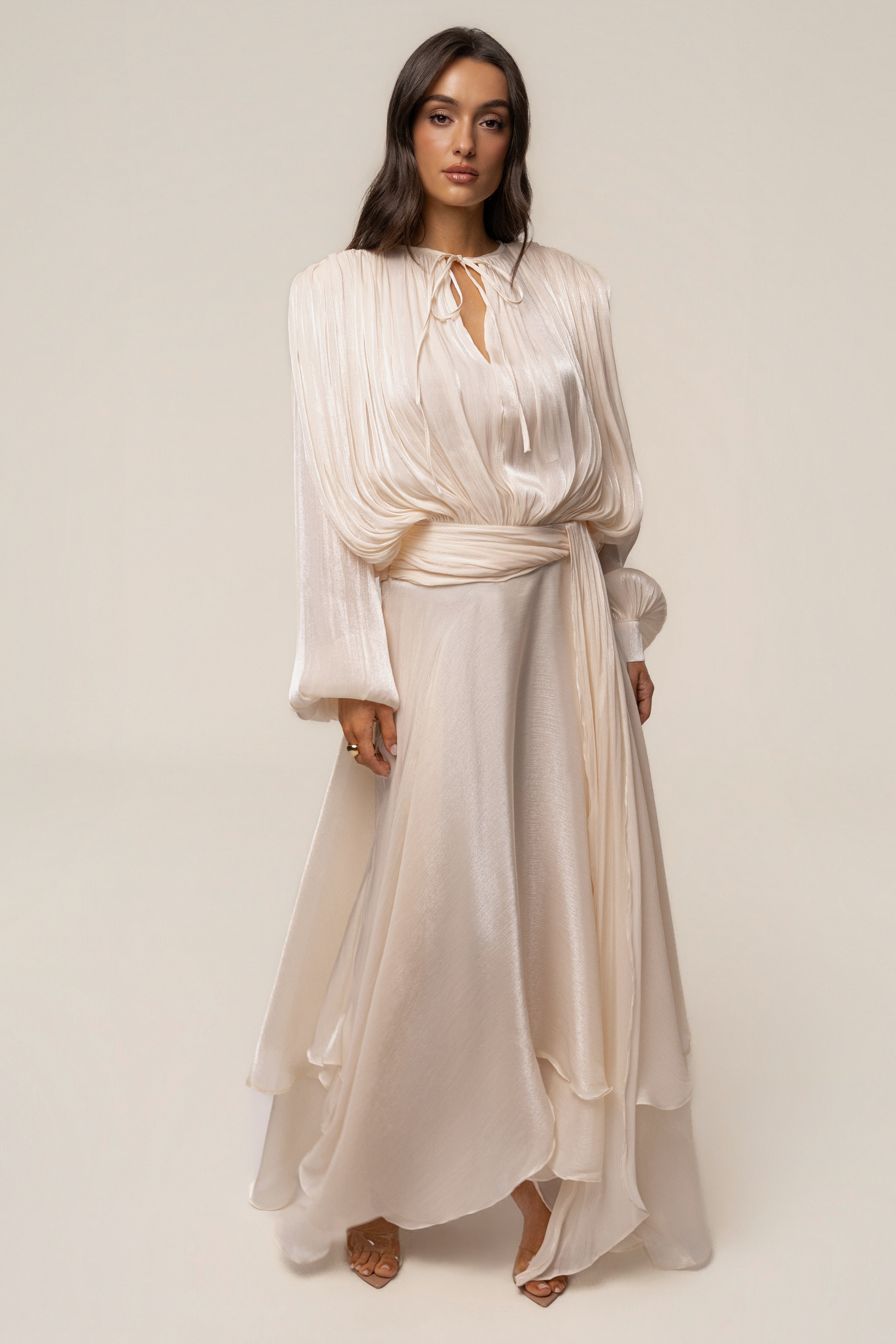 Cream Draped In Elegance maxi dress by JLUXLABEL, featuring a flowing silhouette and sophisticated draped details.