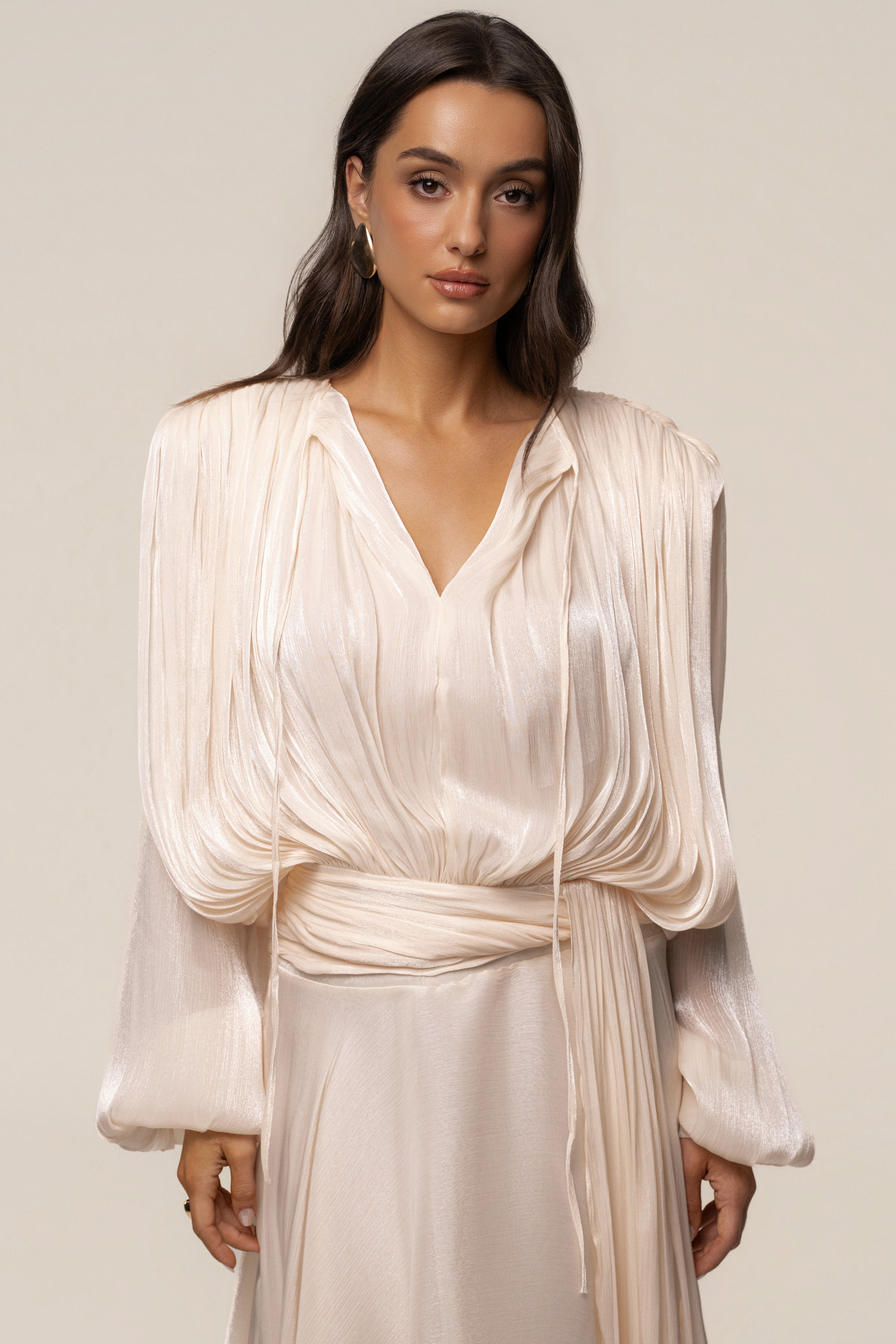Cream draped elegance maxi dress from JLUXLABEL featuring flowing fabric and sophisticated design for formal occasions.