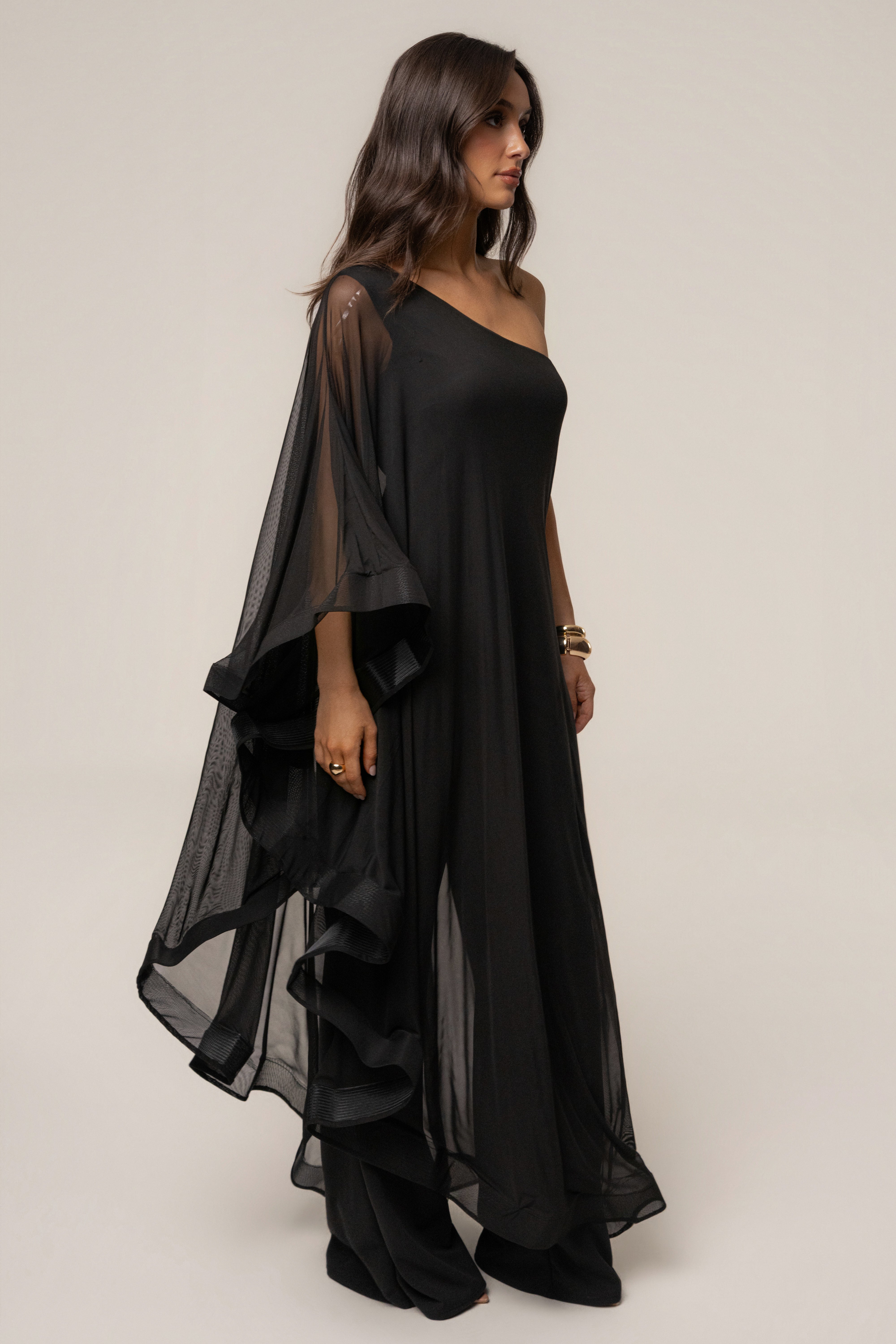 Black New Waves Jumpsuit by JLUXLABEL, stylish one-piece with a sleek fit and wave-inspired design, shown on a model.