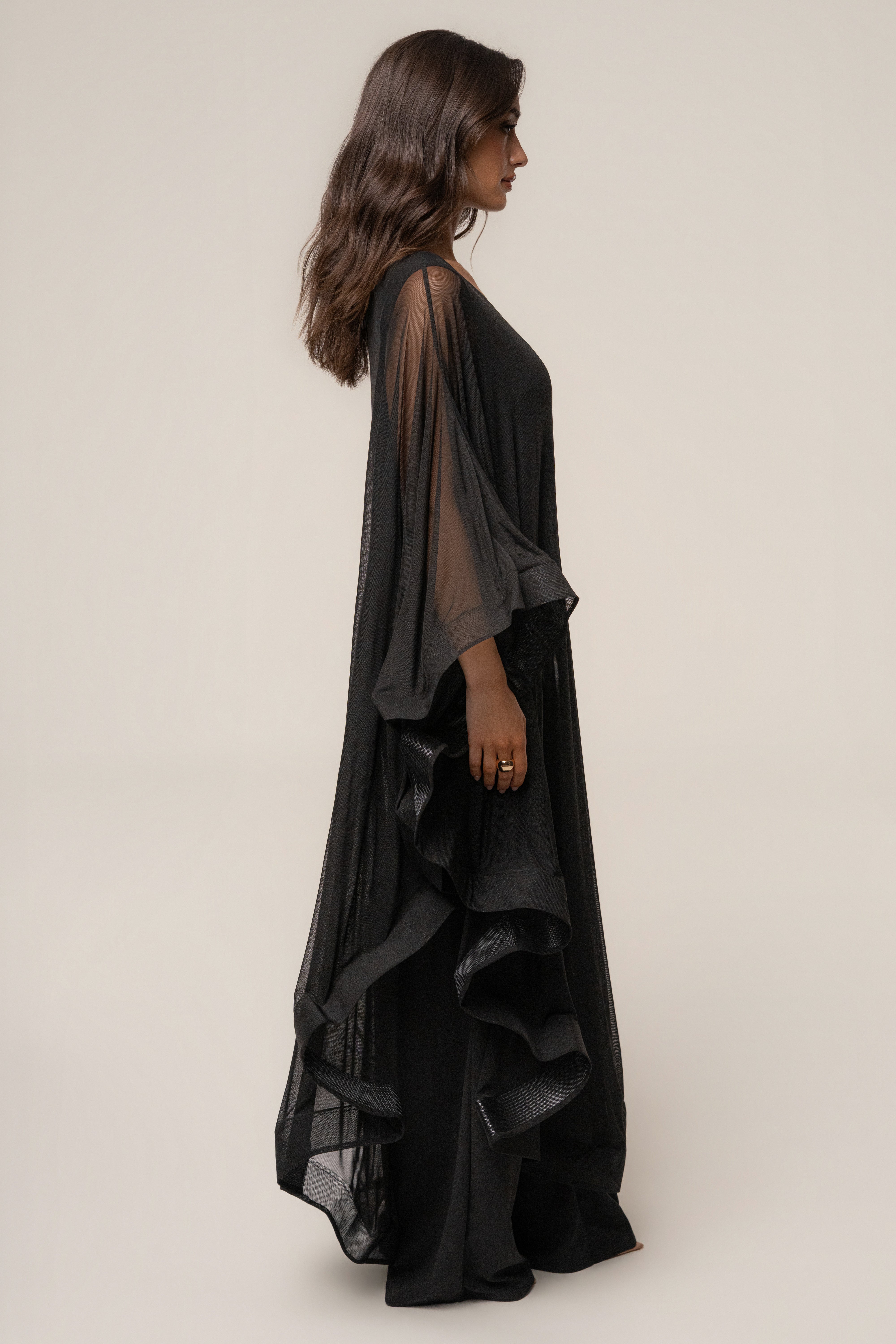 Black New Waves JLUXLABEL jumpsuit featuring a sleek, fitted design with wide legs and a stylish neckline.