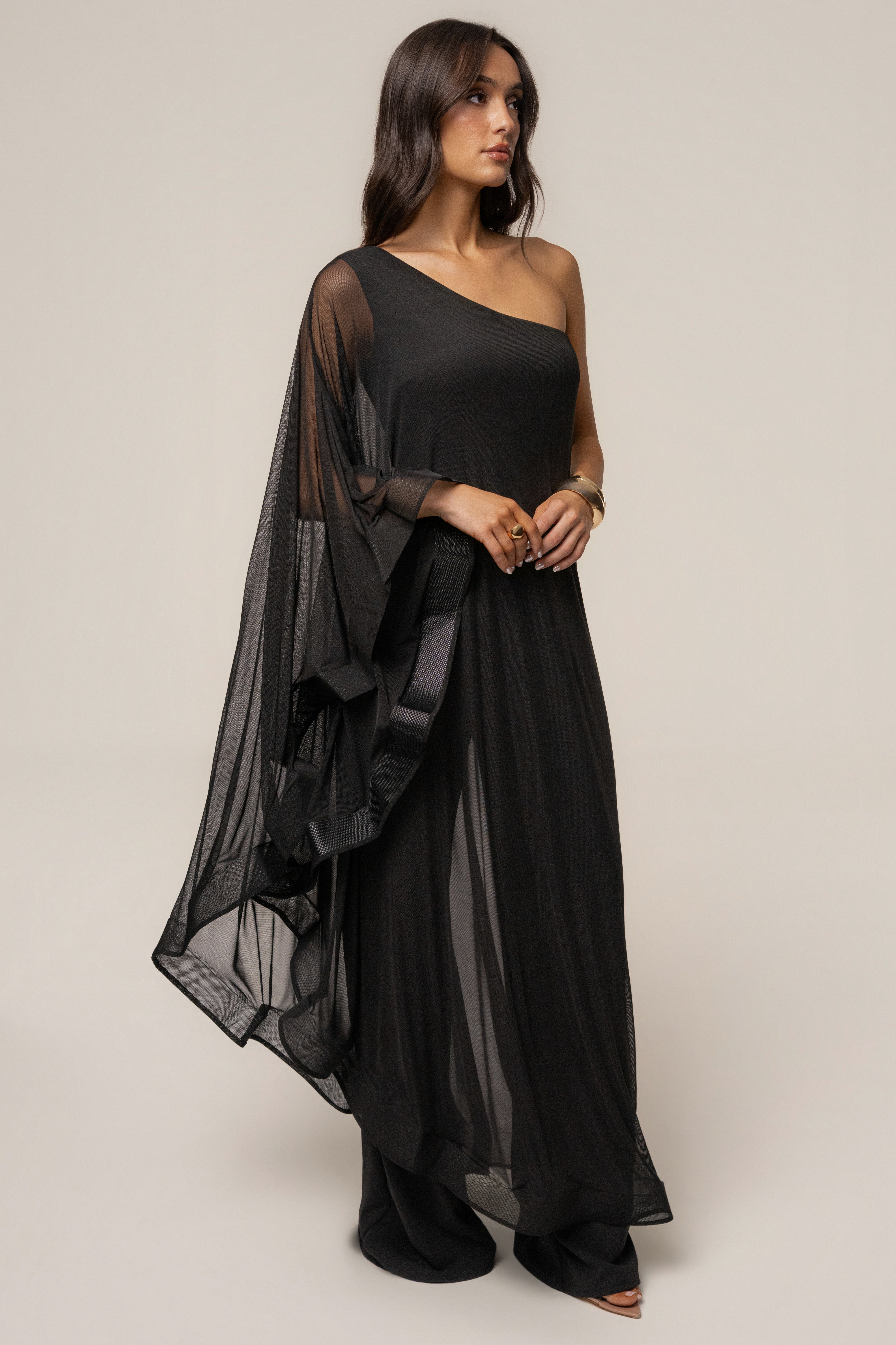 Black New Waves Jumpsuit by JLUXLABEL featuring a sleek, fitted design with long sleeves and stylish wave pattern detail.