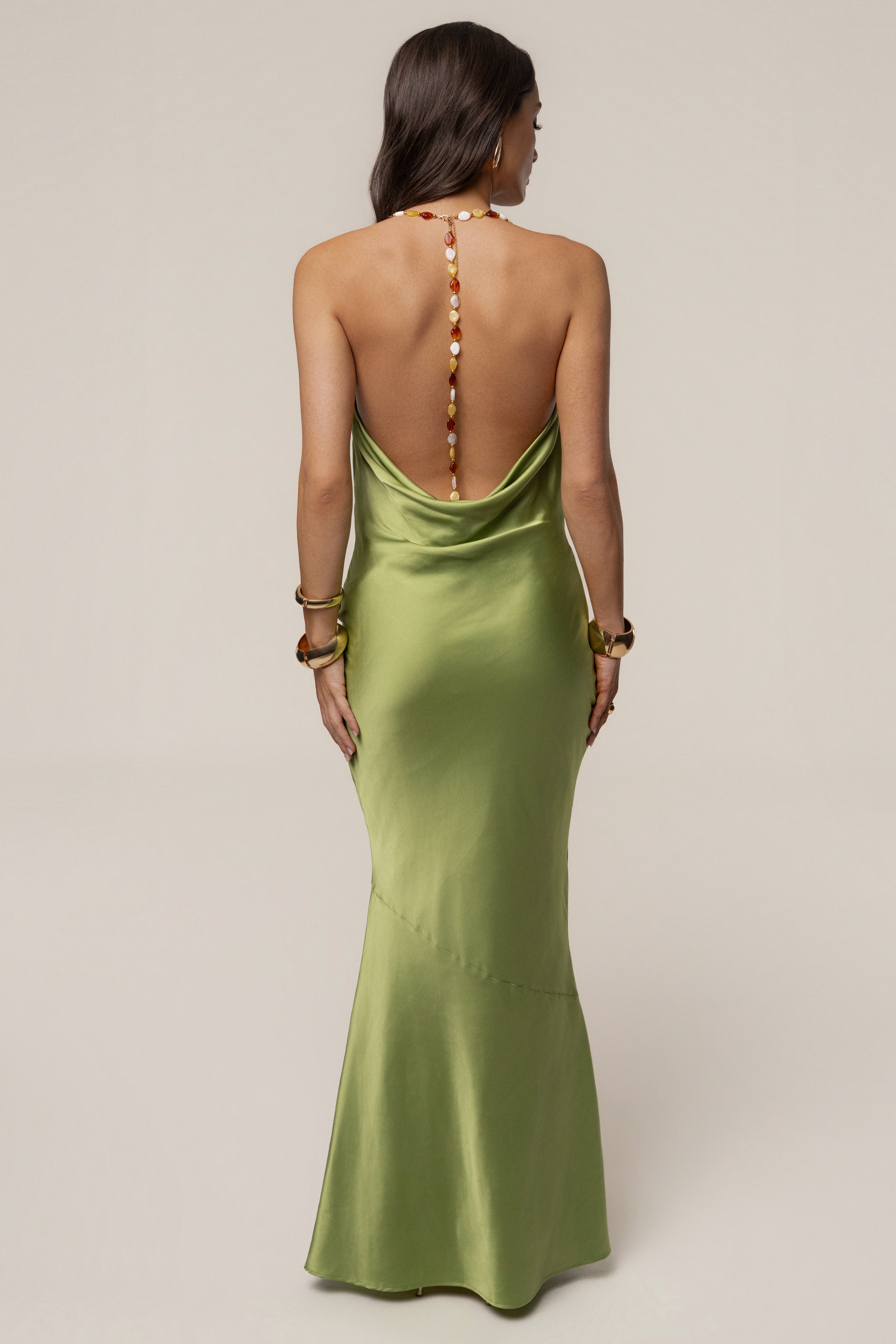 Green Bethani Maxi Dress by JLUXLABEL, flowing fabric, sleeveless design, and elegant silhouette perfect for summer occasions.