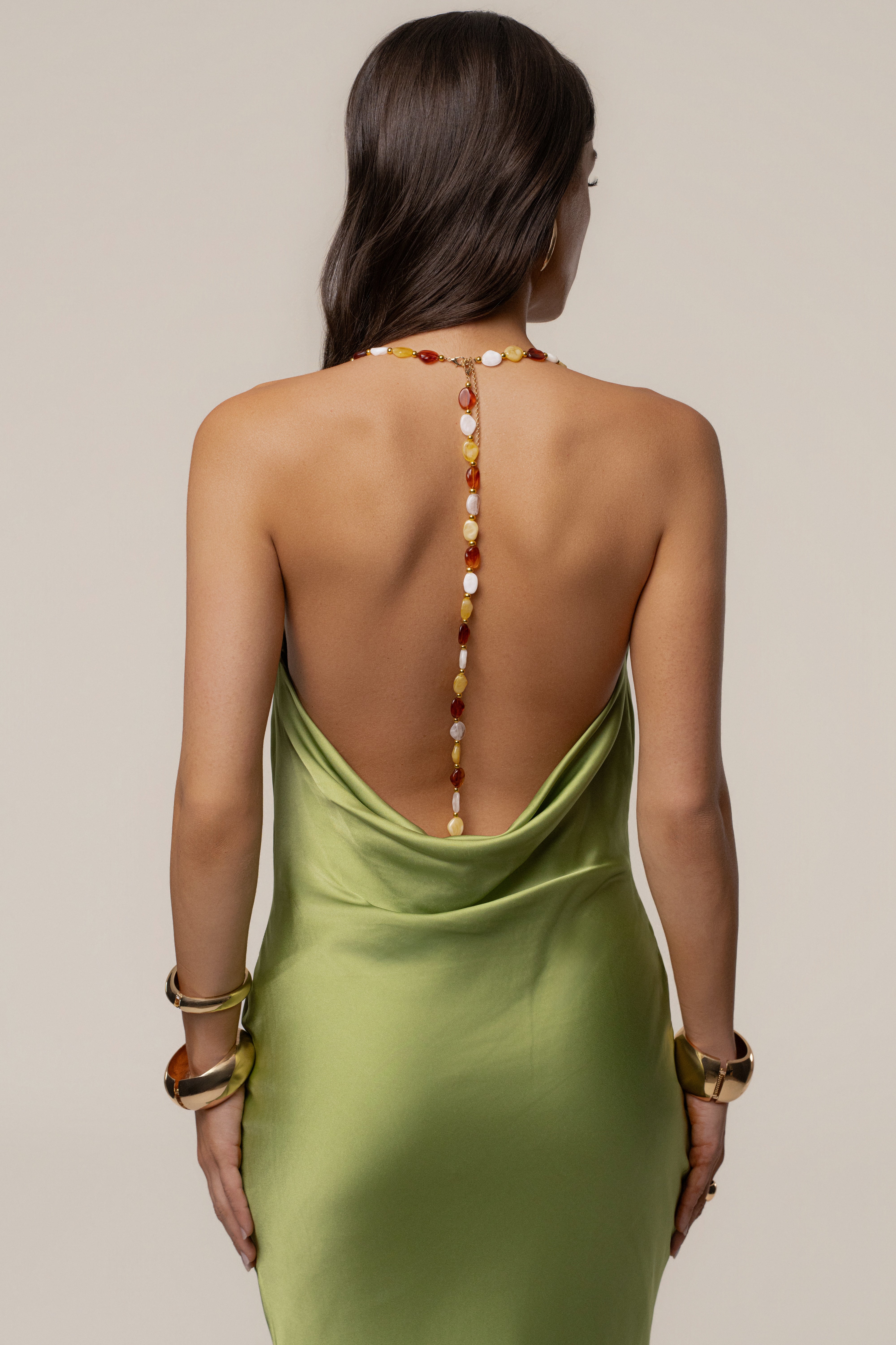 Green Bethani Maxi Dress by JLUXLABEL, flowing fabric with a fitted bodice and elegant length, perfect for summer or special occasions.