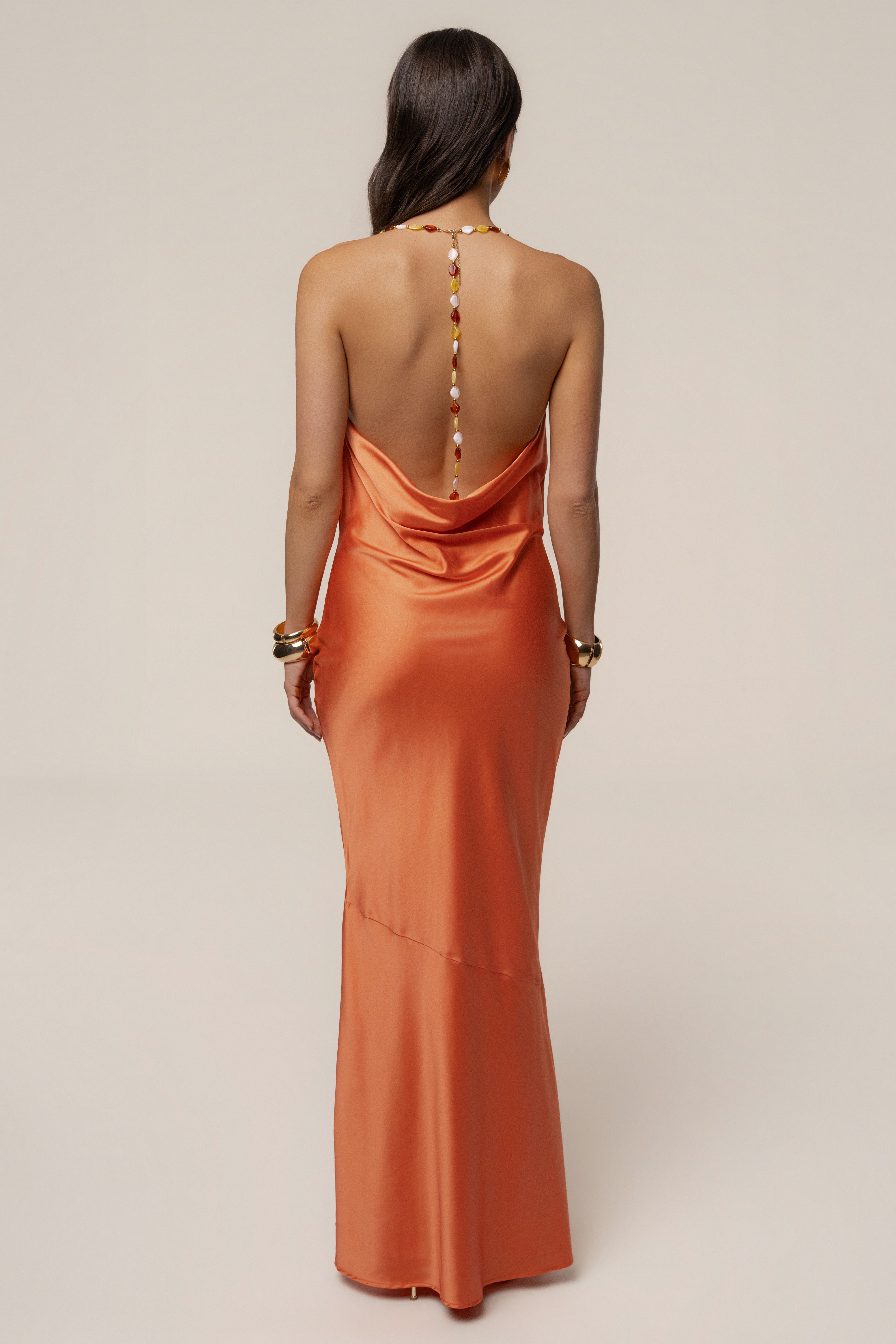 Orange Bethani maxi dress by JLUXLABEL, flowing fabric with a fitted bodice and elegant ankle-length design.