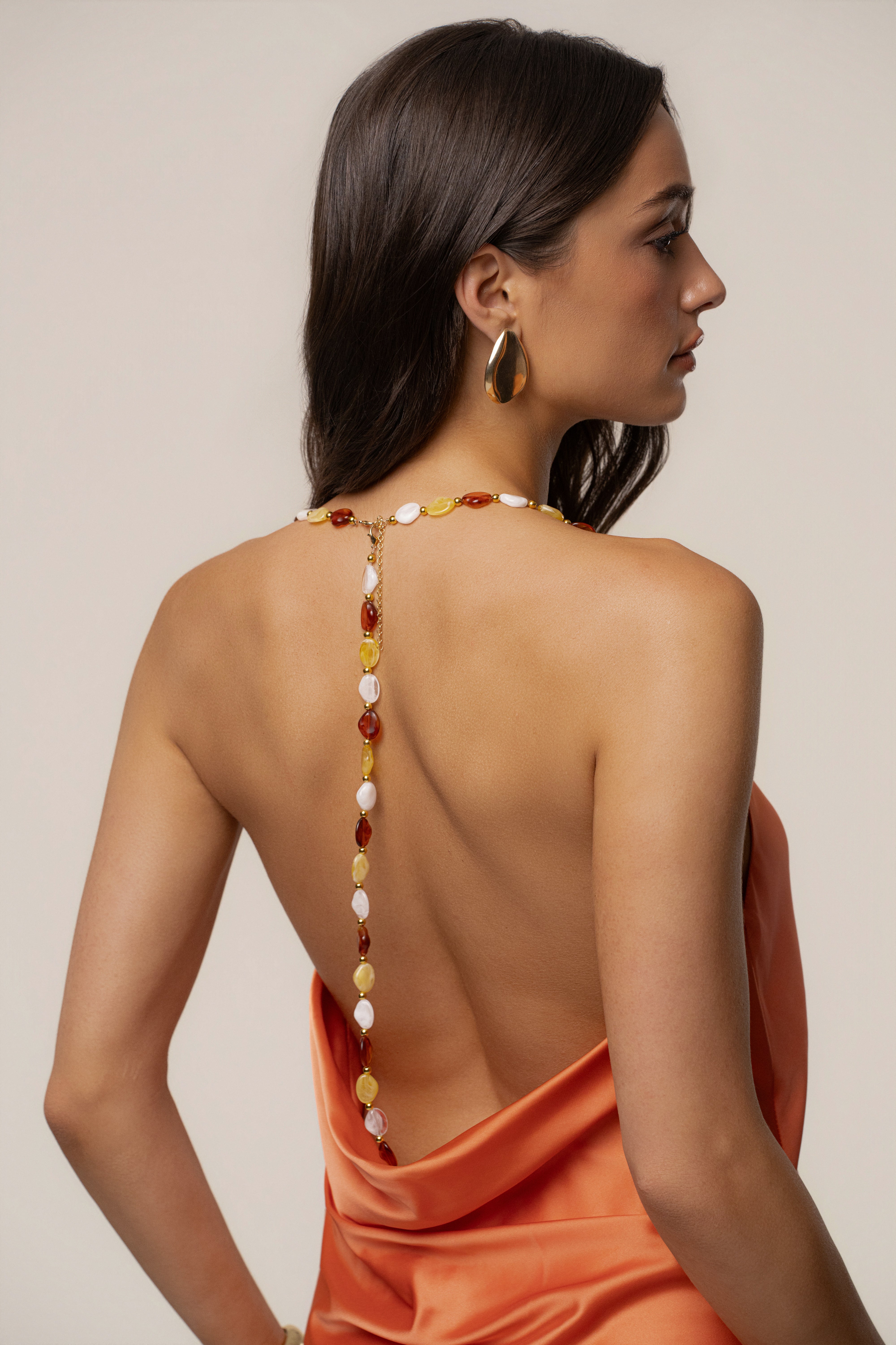 Orange Bethani maxi dress by JLUXLABEL featuring flowing fabric and a stylish, elegant design suitable for summer occasions.