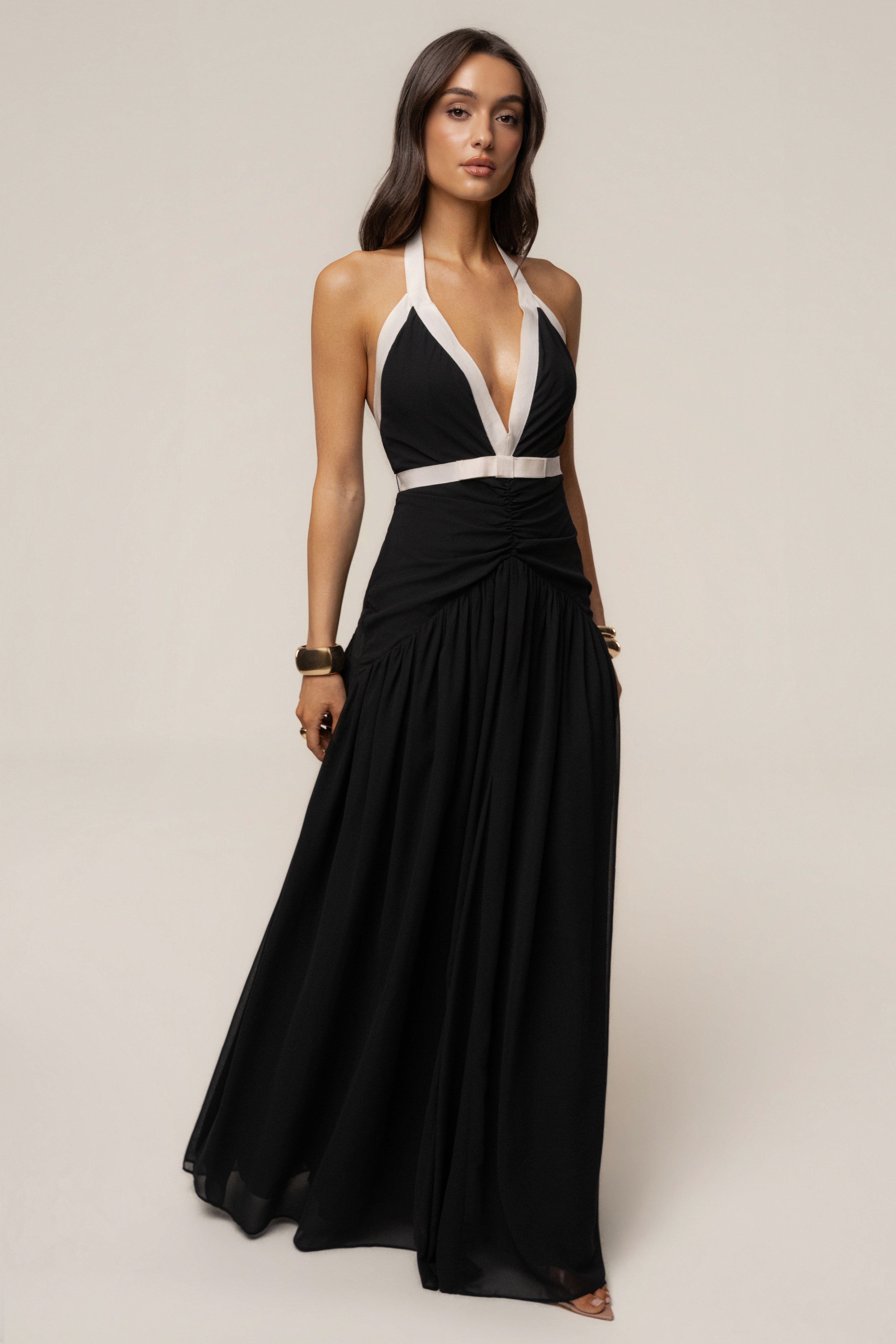 Black and white tourist contrast maxi dress by JLUXLABEL featuring a flowing silhouette and bold color block design.