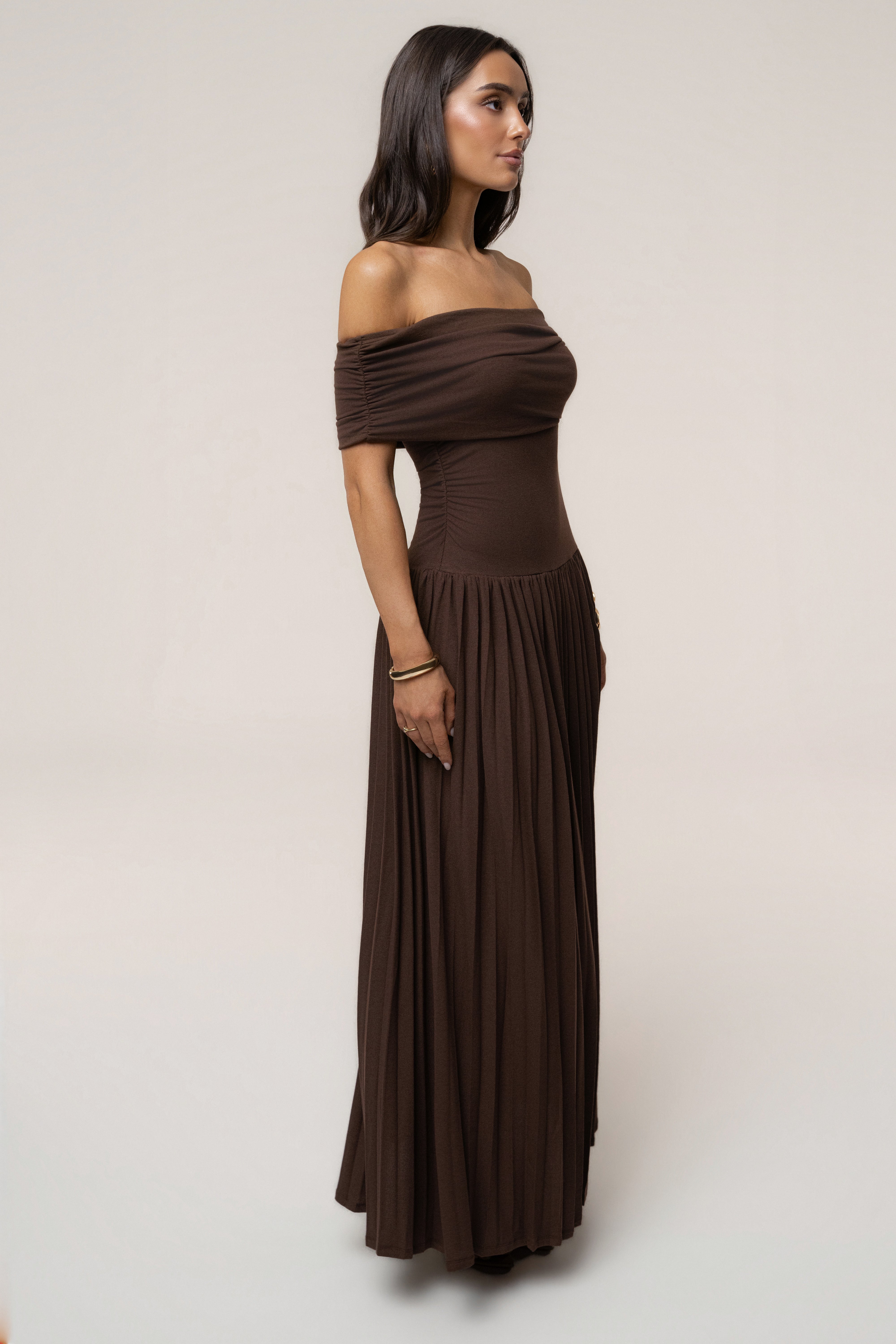 Brown JLUXLABEL pleated maxi dress with infinite pleats, flowing silhouette, and elegant design, perfect for stylish occasions.