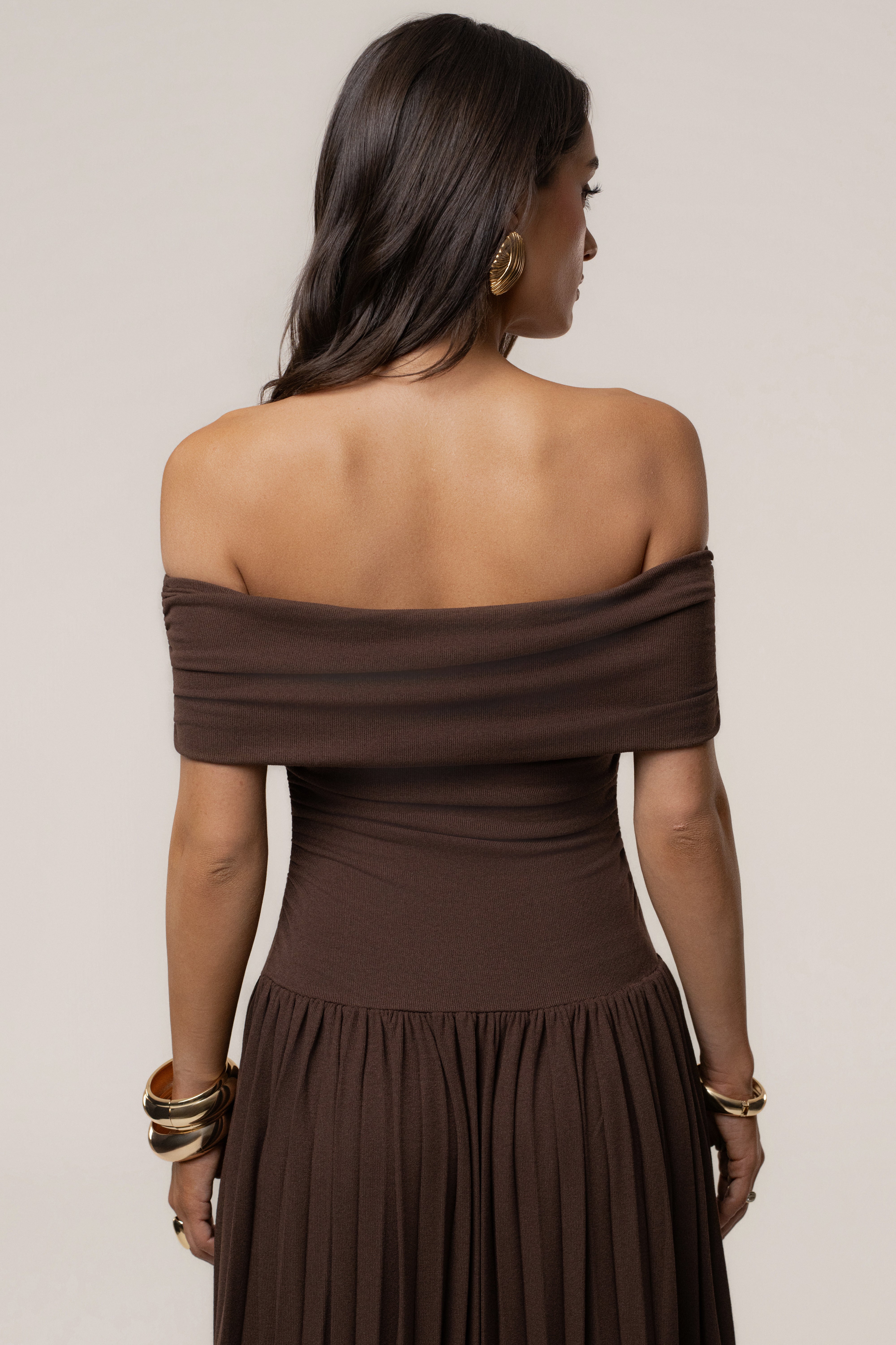 Brown JLUXLABEL pleated maxi dress with infinite design, flowing fabric, and elegant style, perfect for summer or special occasions.