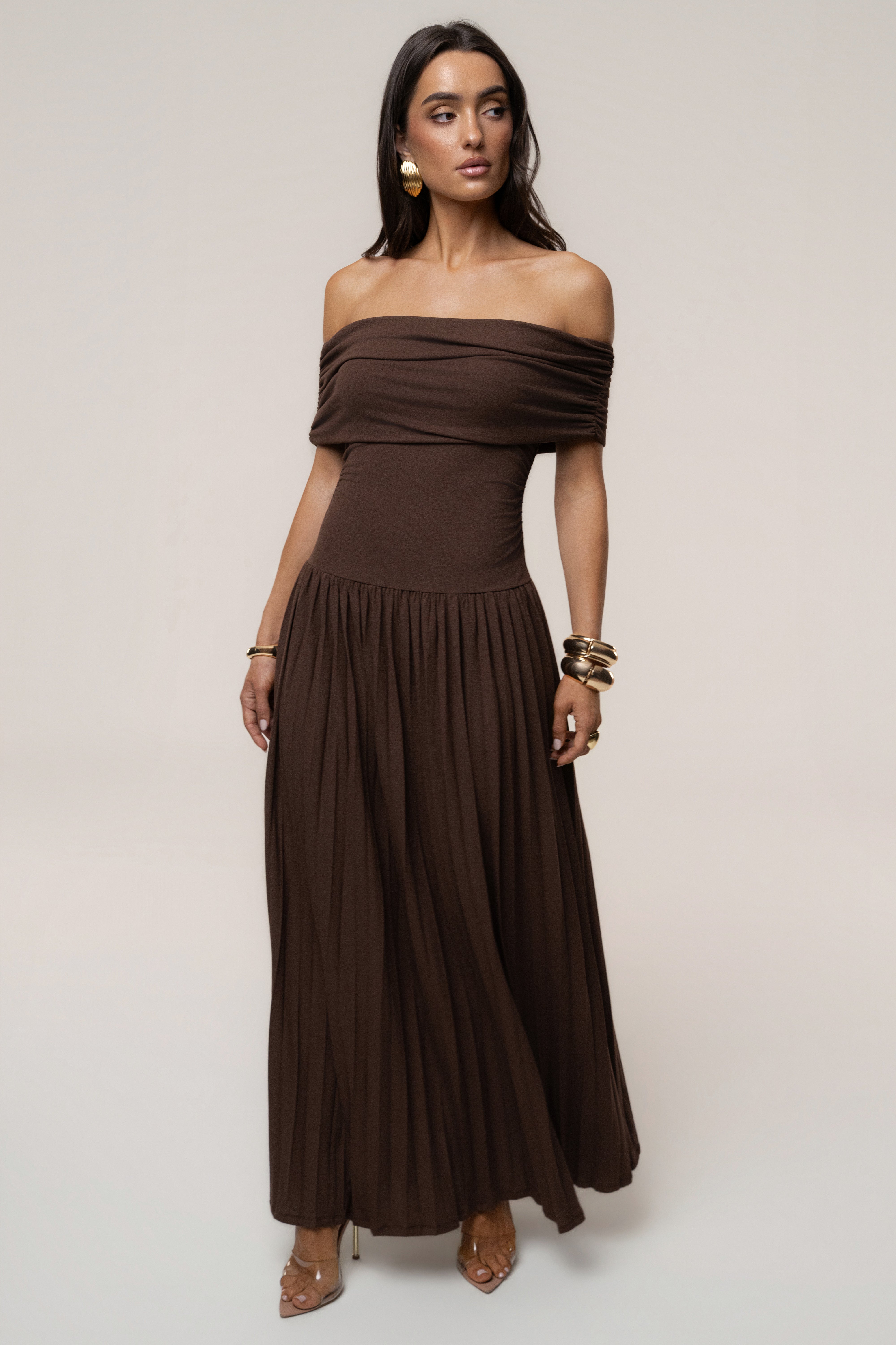 Brown JLUXLABEL pleated maxi dress with infinite pleats, flowy silhouette, and elegant design perfect for stylish occasions.