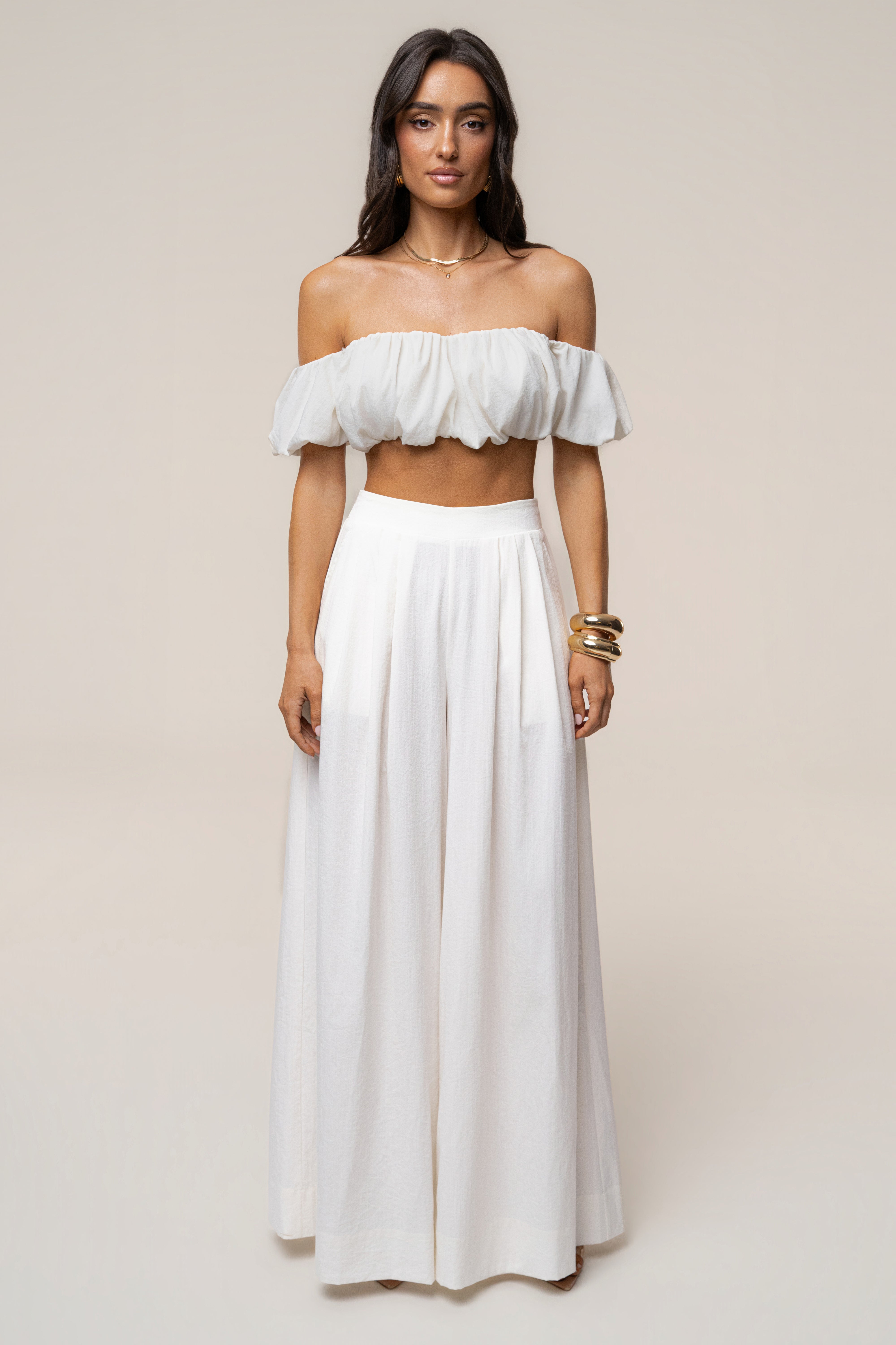 Ivory Sunset Breeze pant set featuring an off-shoulder crop top and wide-leg pants