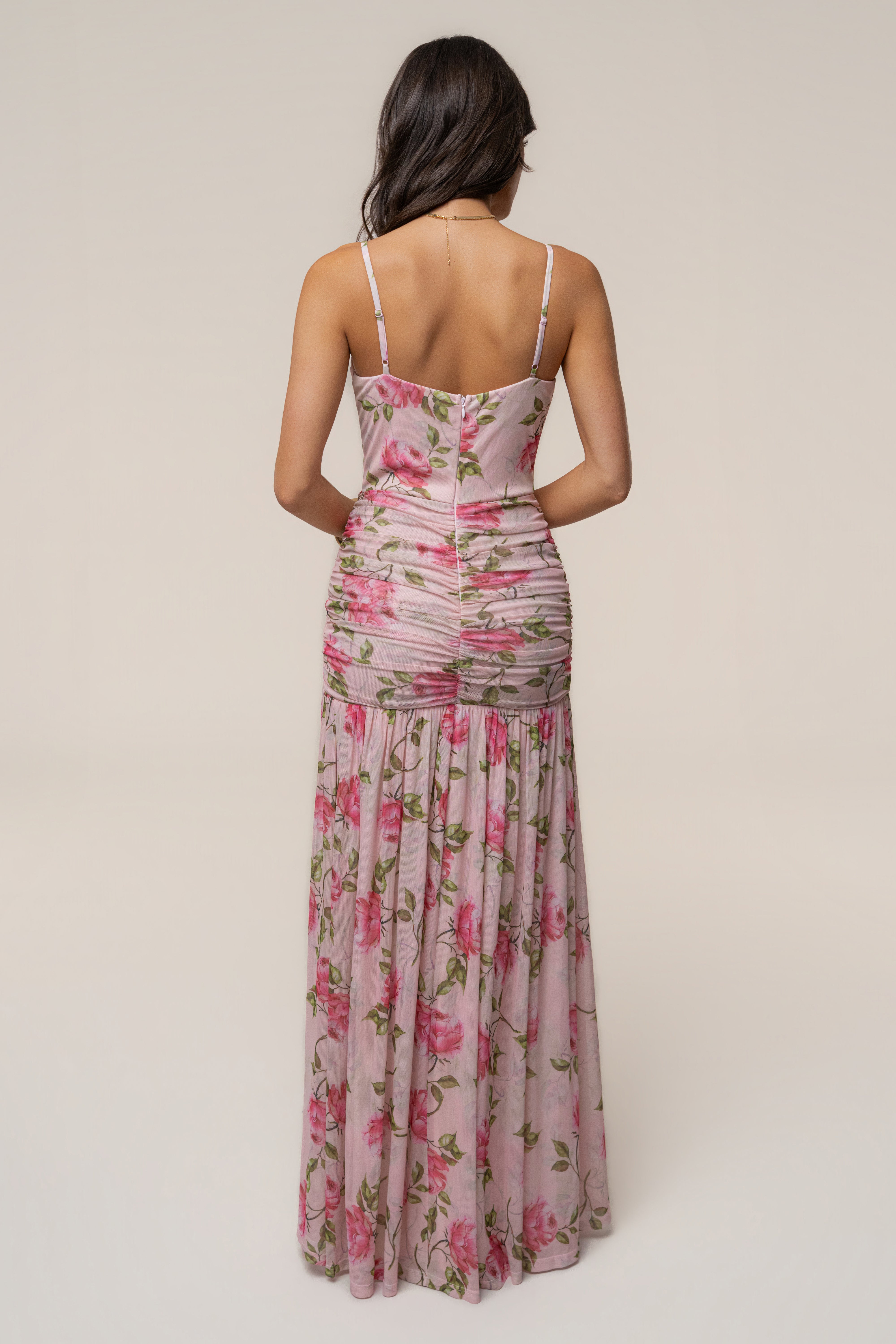 Pink Blooming Elegance Maxi Dress by JLUXLABEL featuring floral print, flowing fabric, and a fitted waist for a stylish look.
