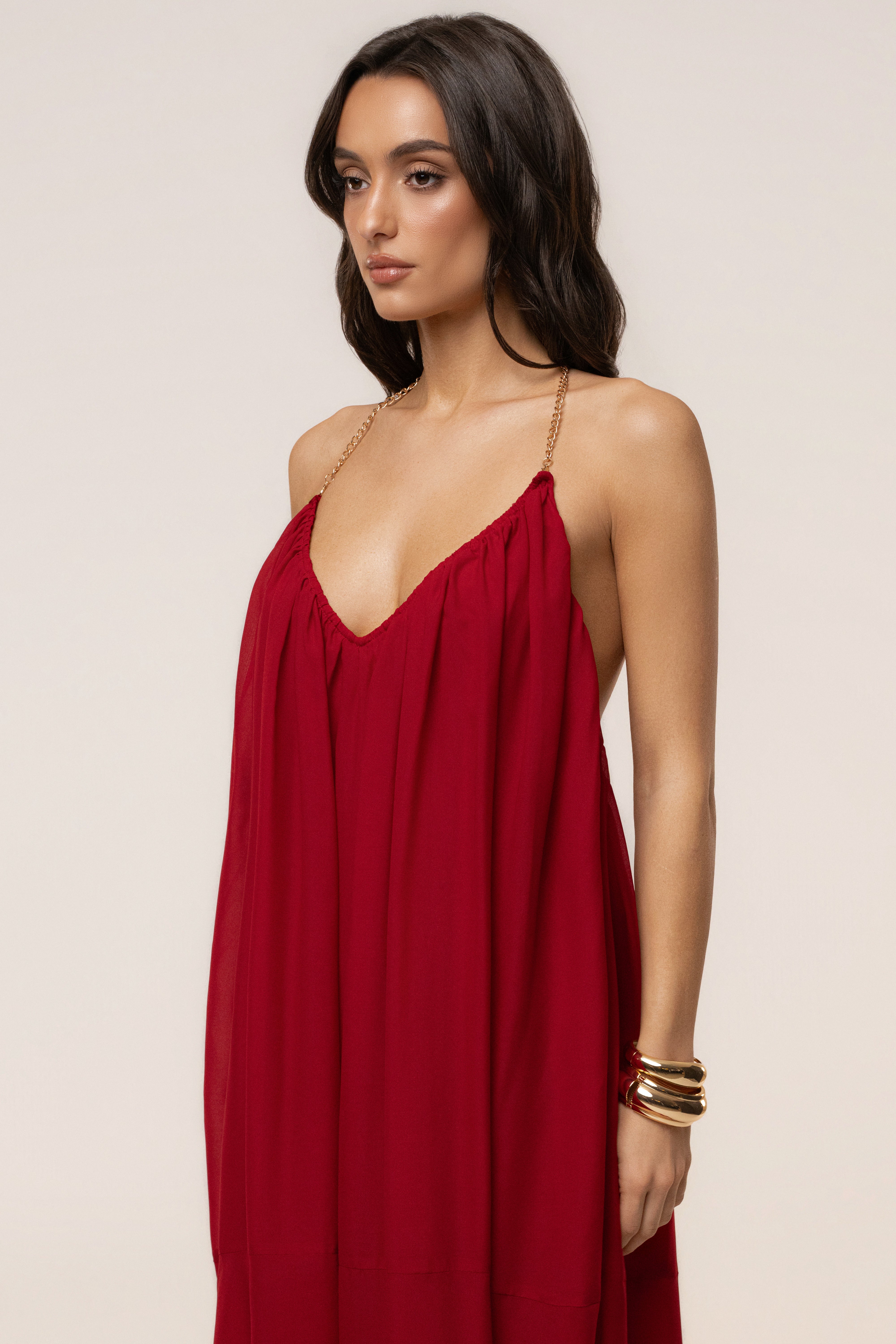 Red Hana backless maxi dress by JLUXLABEL, flowing fabric, deep back design, perfect for elegant summer occasions.