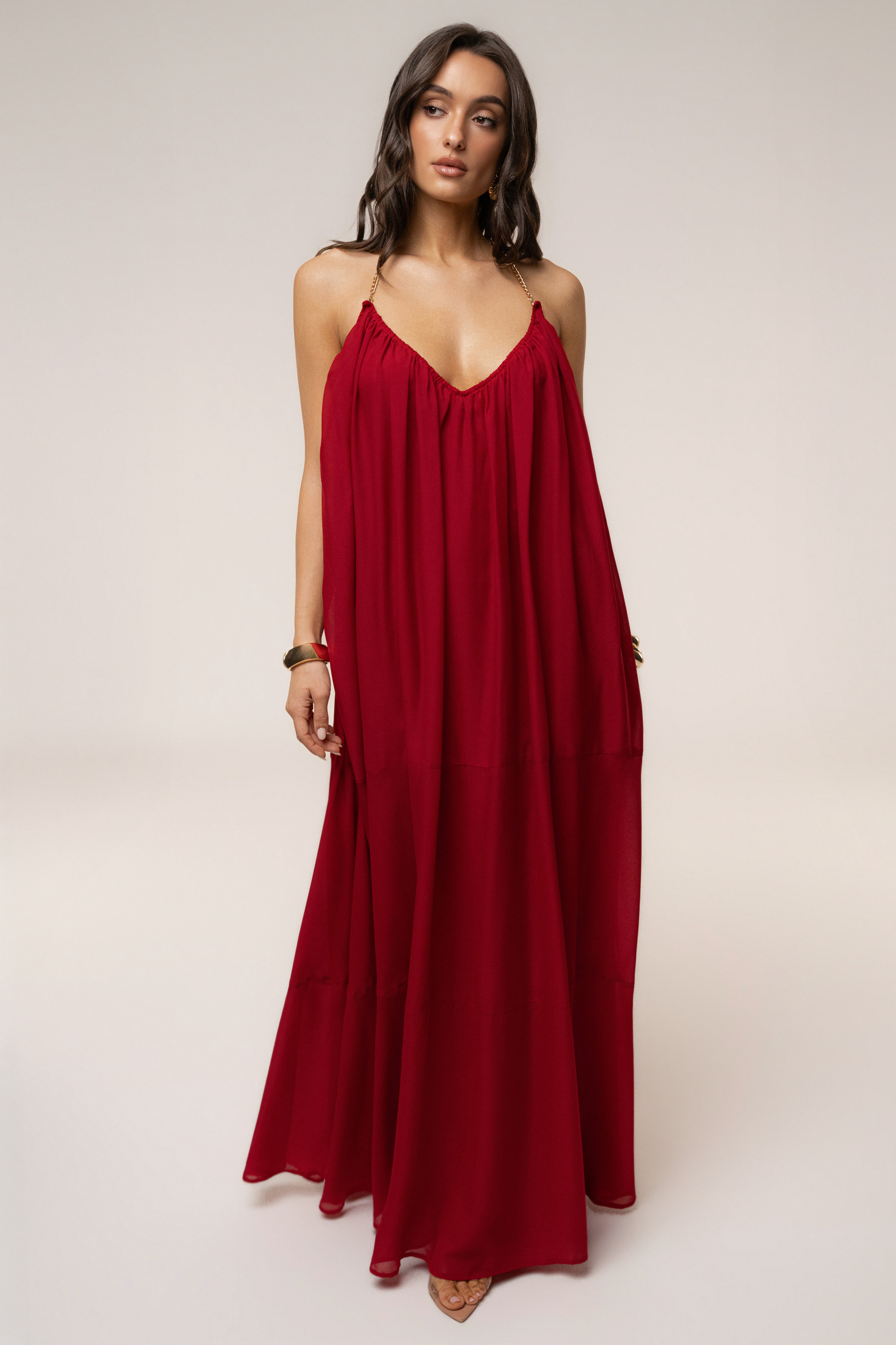 Red Hana backless maxi dress by JLUXLABEL featuring a flowing silhouette and elegant sleeveless design.