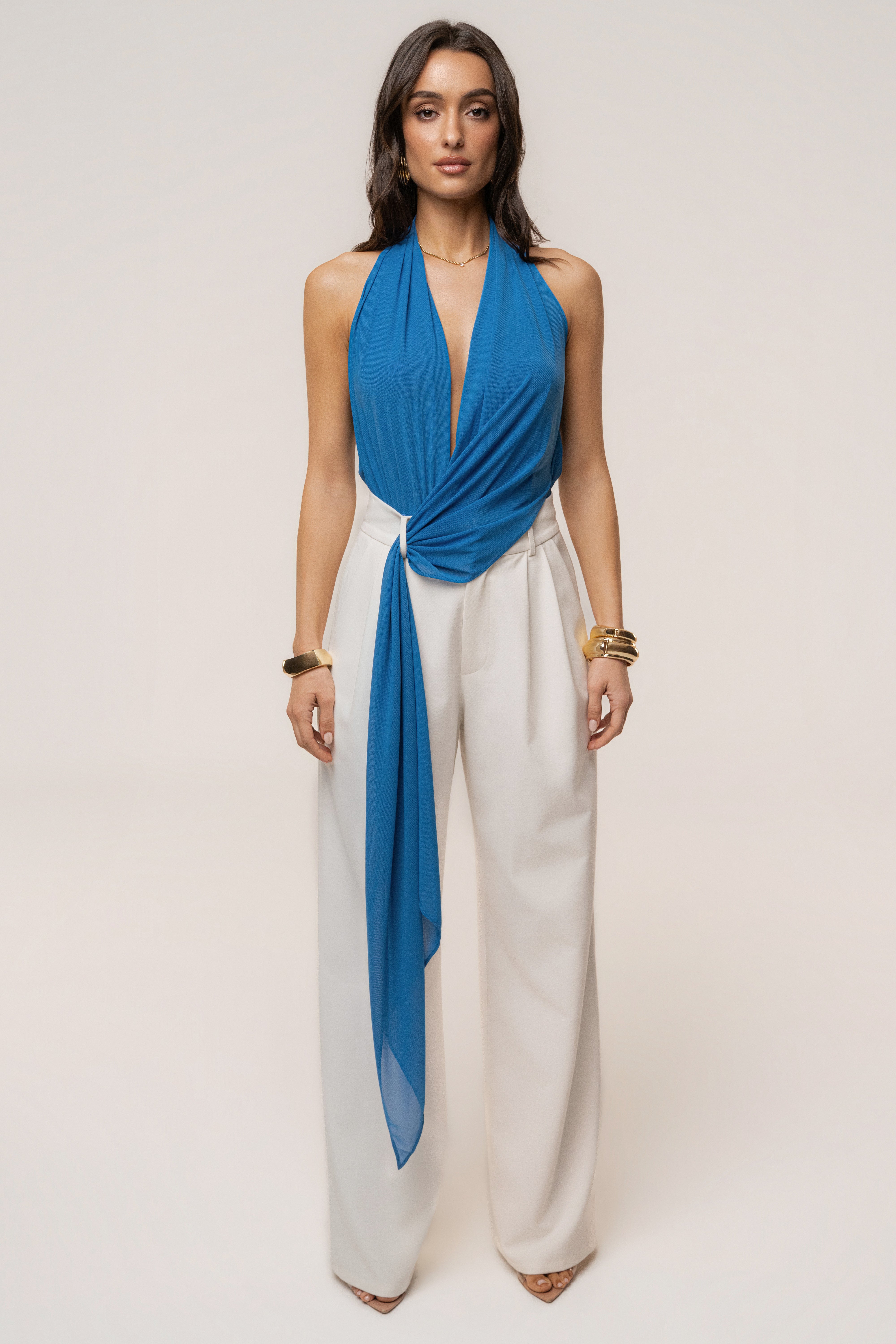Blue Bare Form plunge bodysuit by JLUXLABEL, featuring a fitted top with a deep V neckline and sleek fabric.