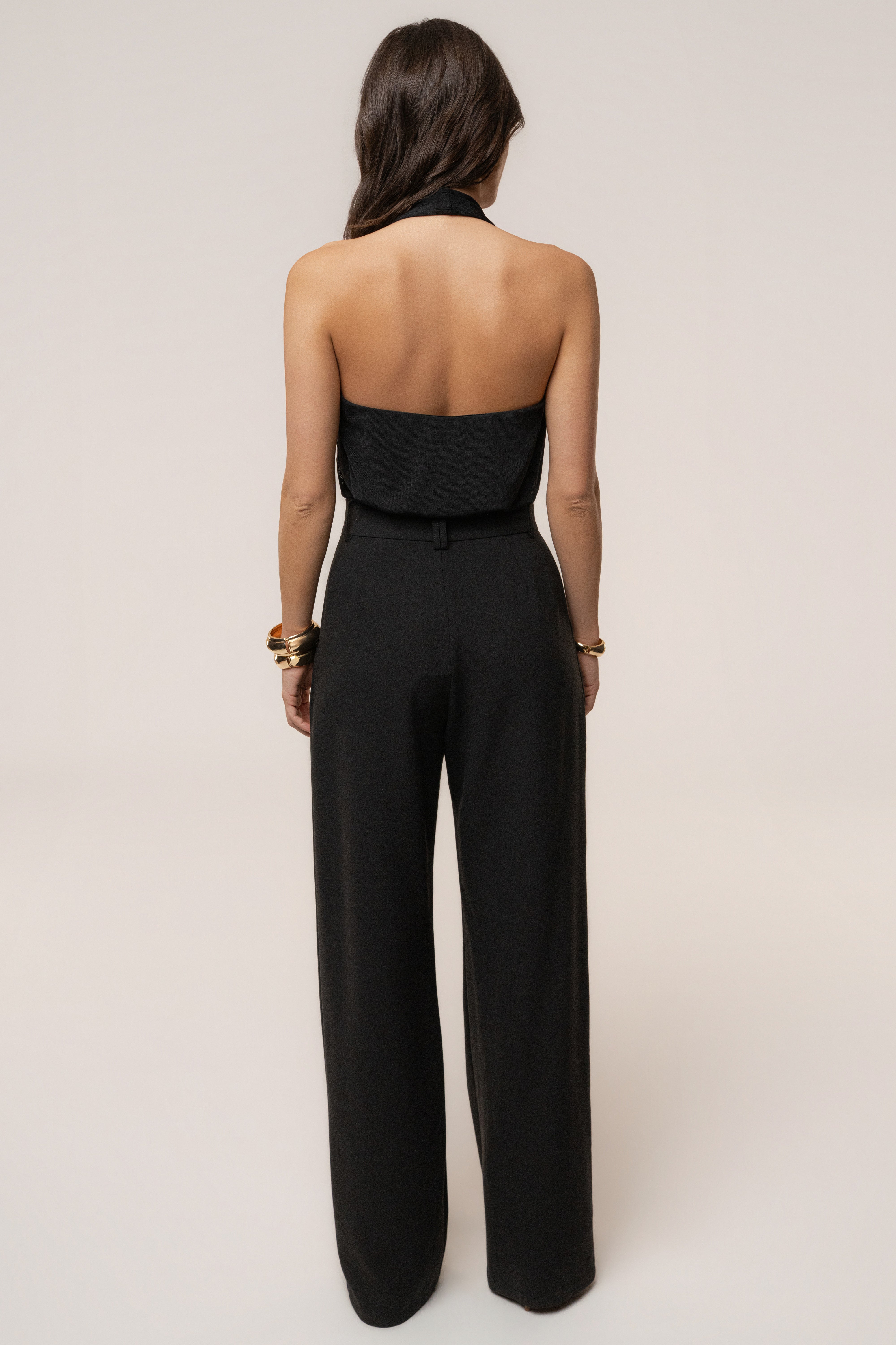 Black JLUXLABEL Bare Form plunge bodysuit, showcasing a fitted top with deep V neckline and sleek design.