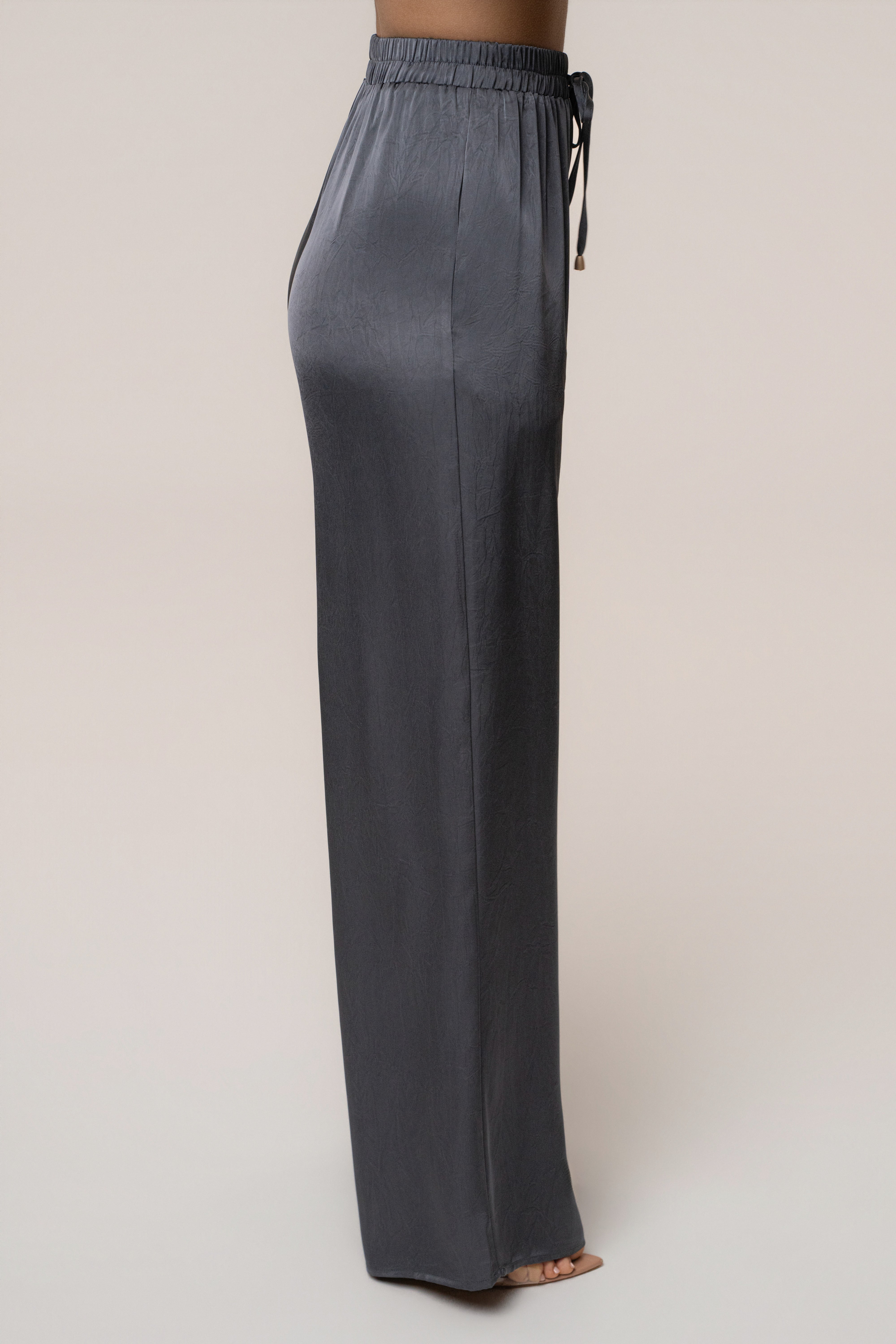 Midnight blue satin pant set with draped design by JLUXLABEL, featuring wide-leg pants and a matching top.