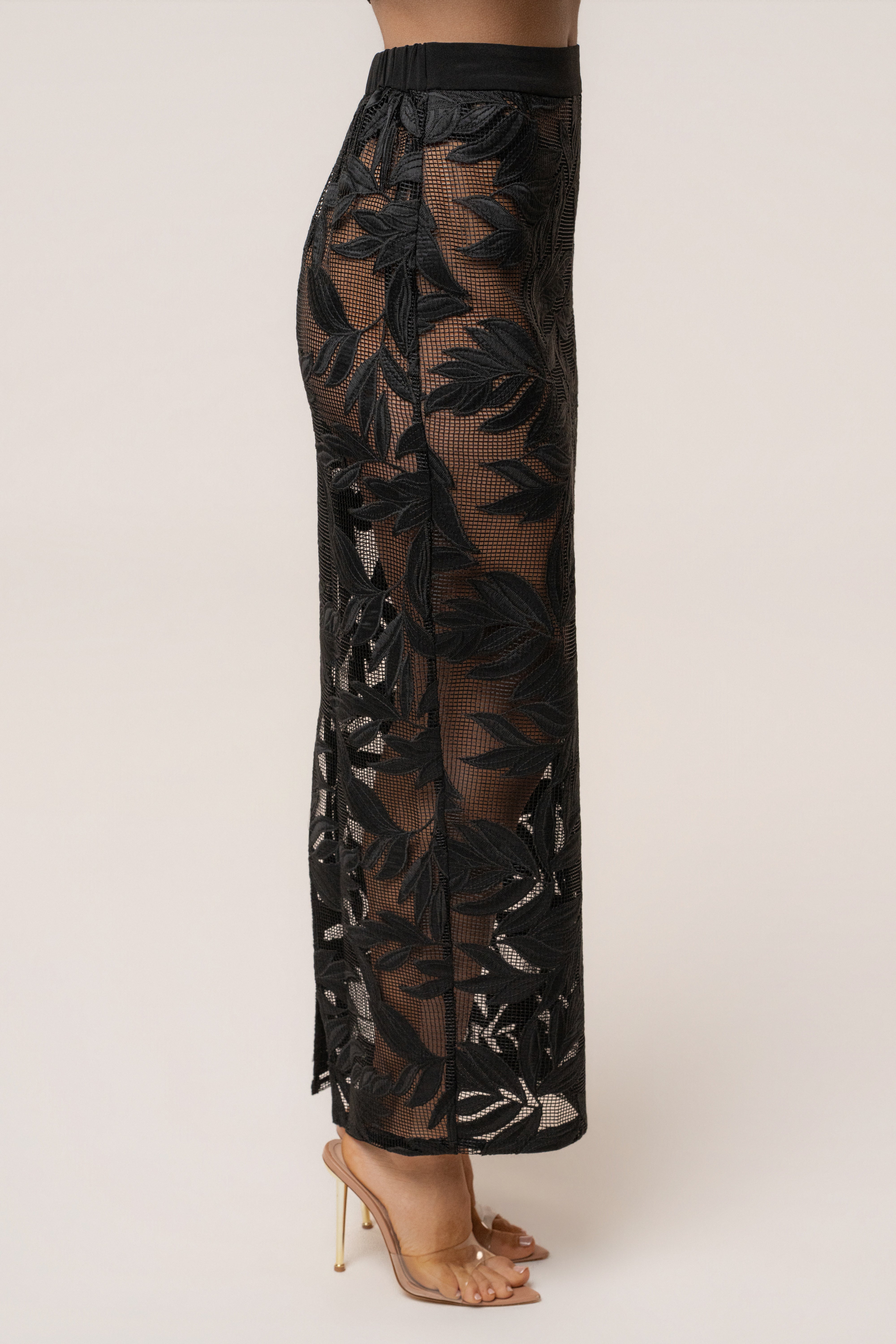 Black Bali Nights embroidered skirt by JLUXLABEL, showcasing intricate embroidery and flowing fabric, styled as a stylish bottoms.