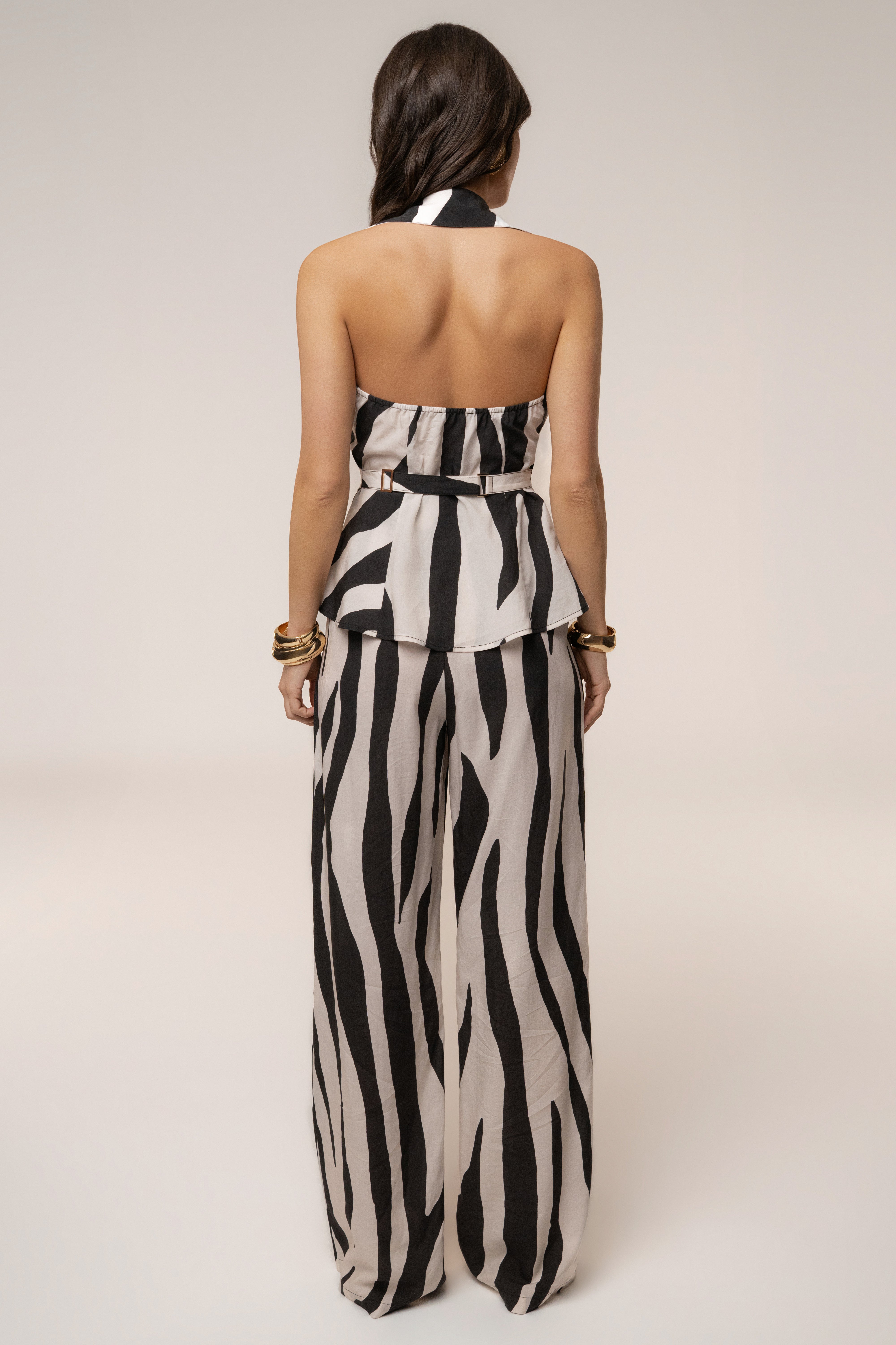 Zebra print tailored halter top by JLUXLABEL featuring a fitted design and stylish neckline.