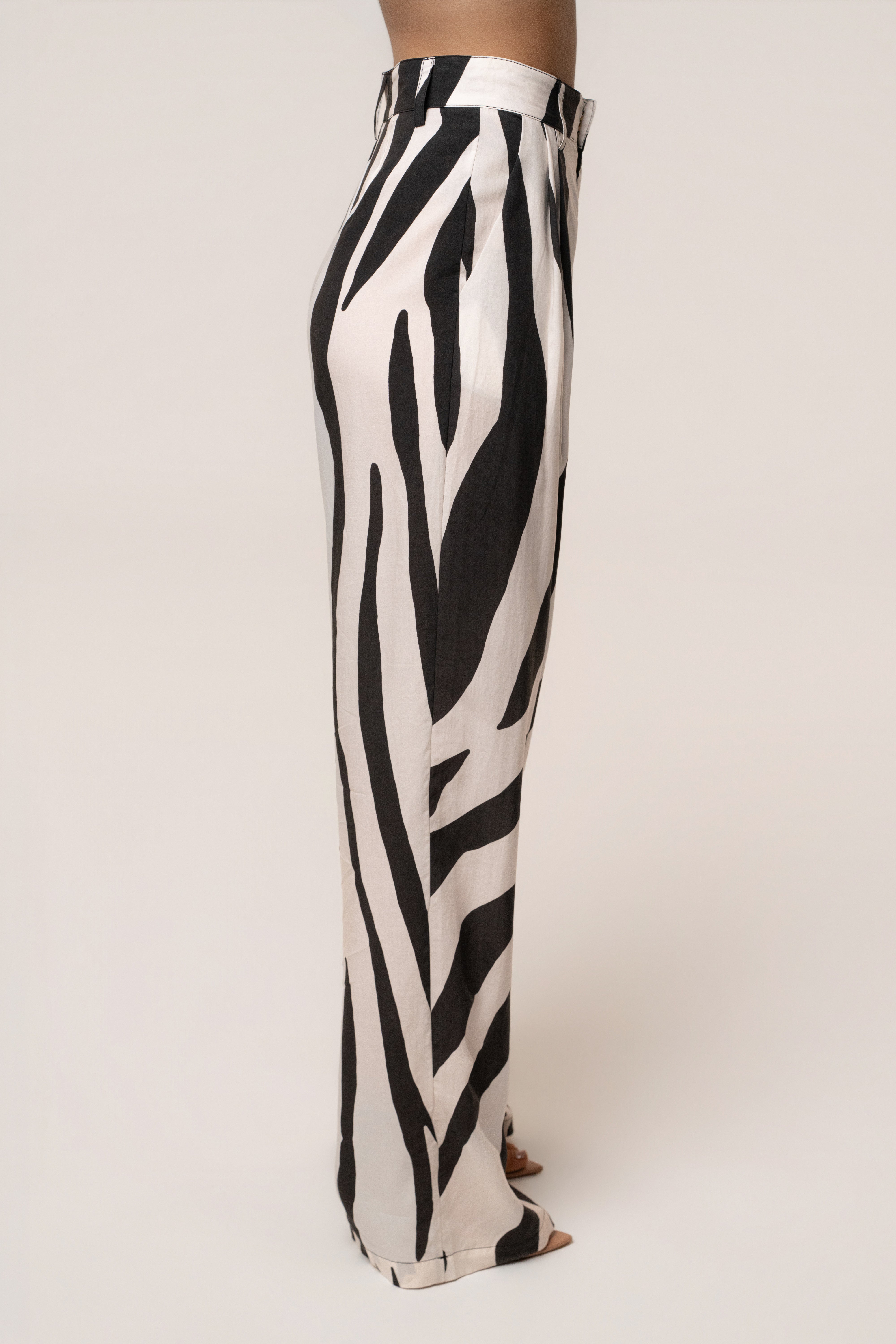 Zebra Essential Flow Trousers in black and white print, stylish bottoms by JLUXLABEL featuring a relaxed fit and tapered design.