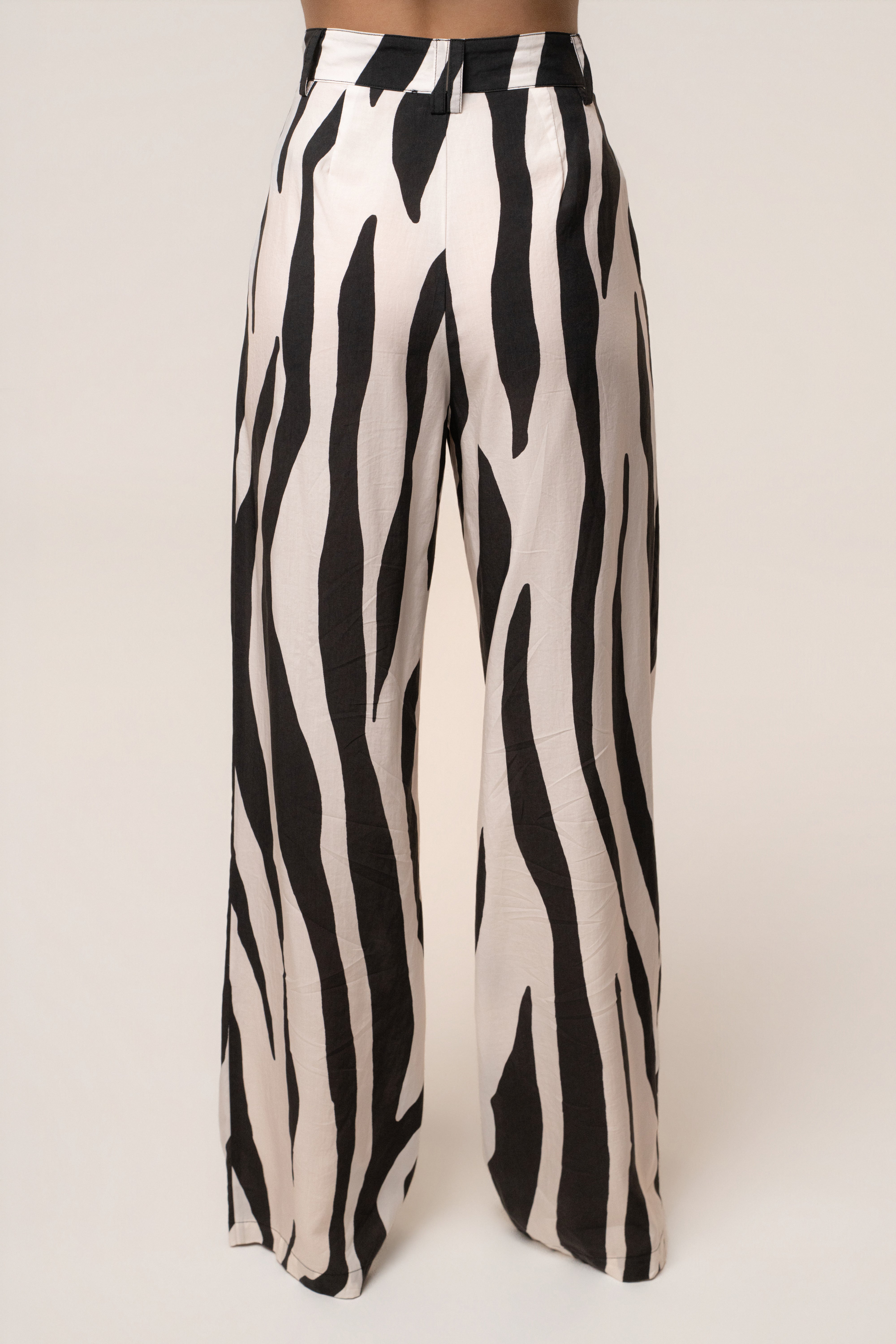 Zebra Essential Flow Trouser by JLUXLABEL, stylish black and white patterned bottoms with a relaxed fit and tailored design.