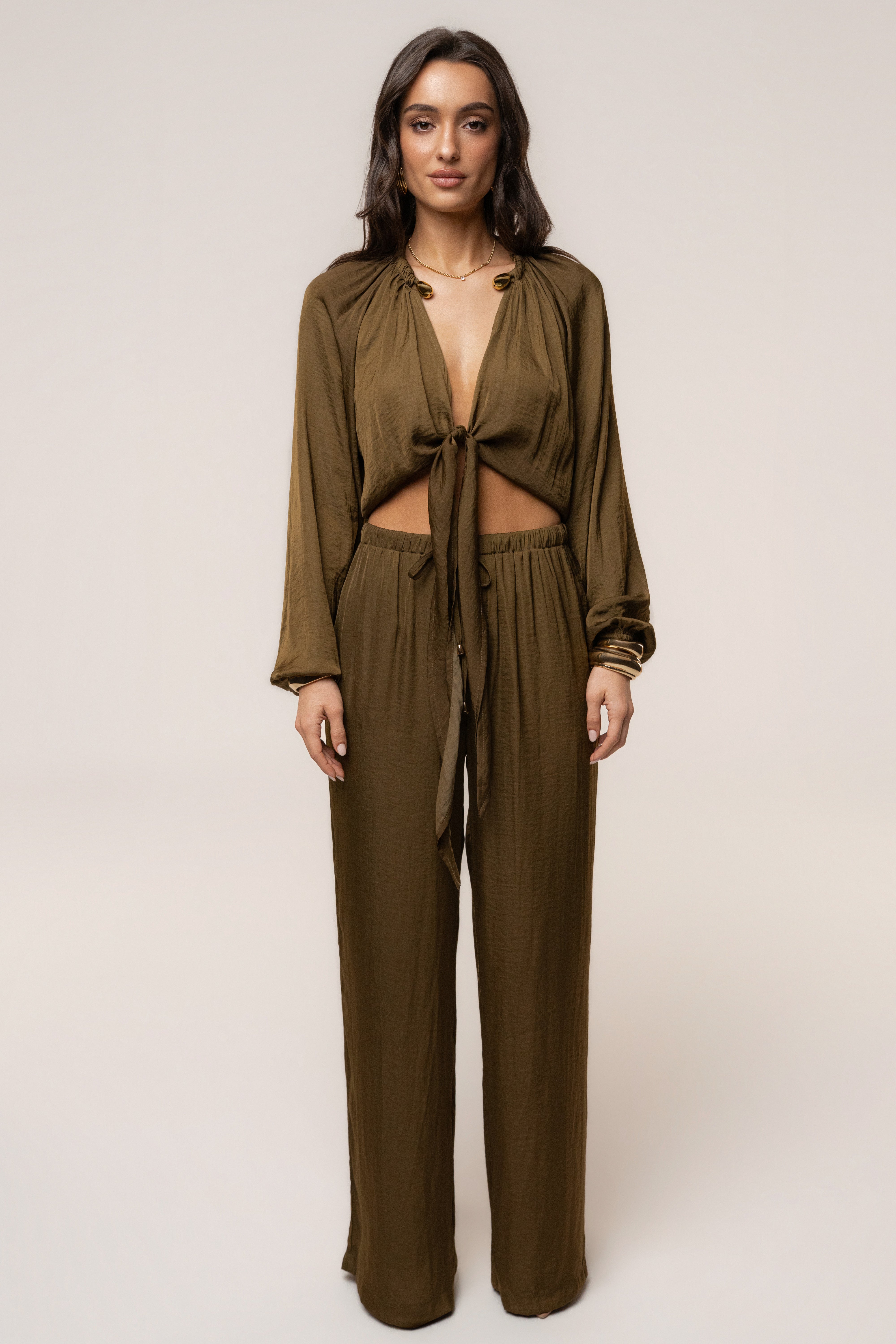 JLUXLABEL Olive Seaside Glow Pants, stylish bottoms with a relaxed fit and olive-green color, perfect for casual or beachwear.