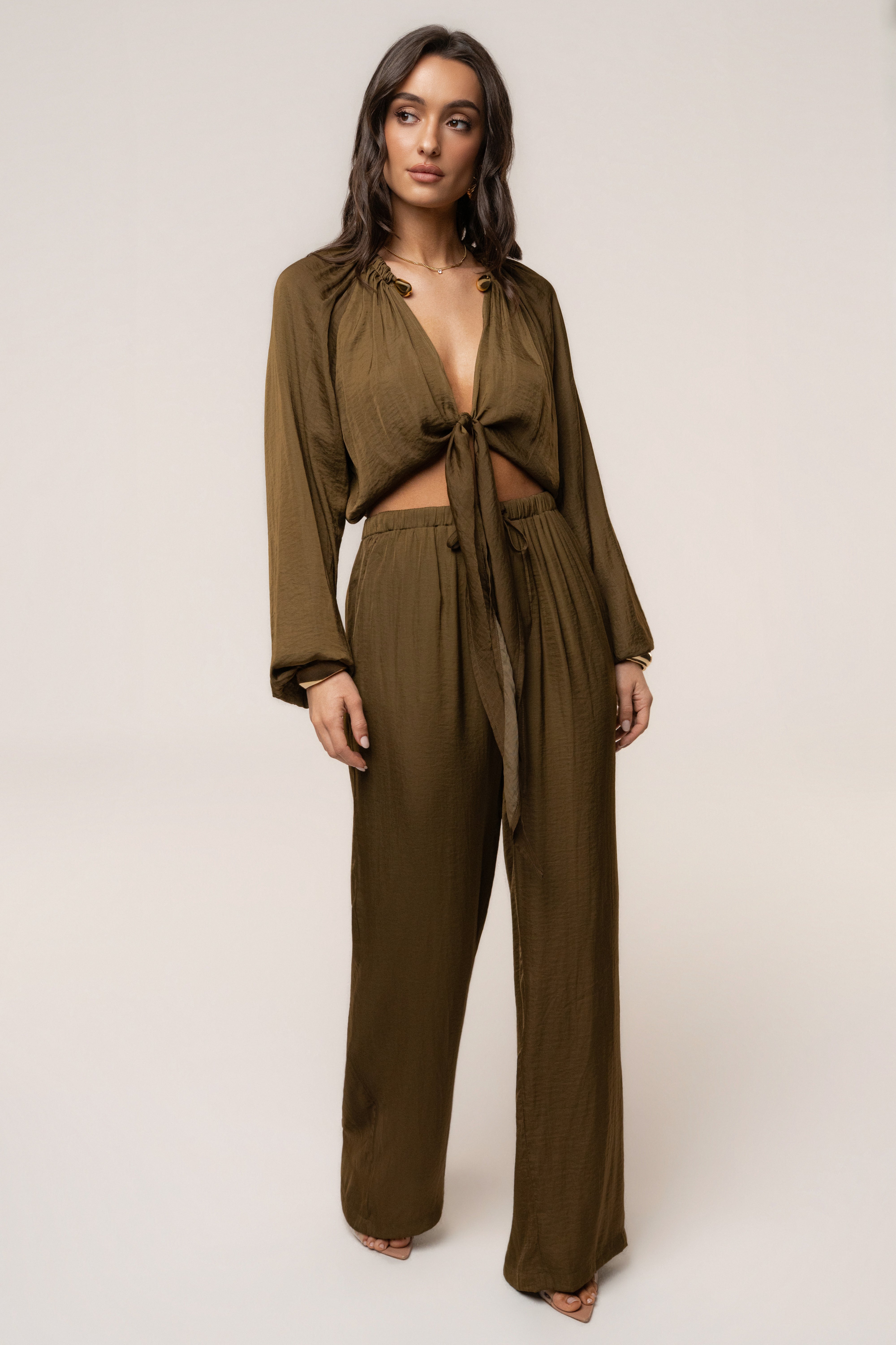 Olive Seaside Glow Top by JLUXLABEL, stylish sleeveless women's top with a relaxed fit and subtle sheen fabric.