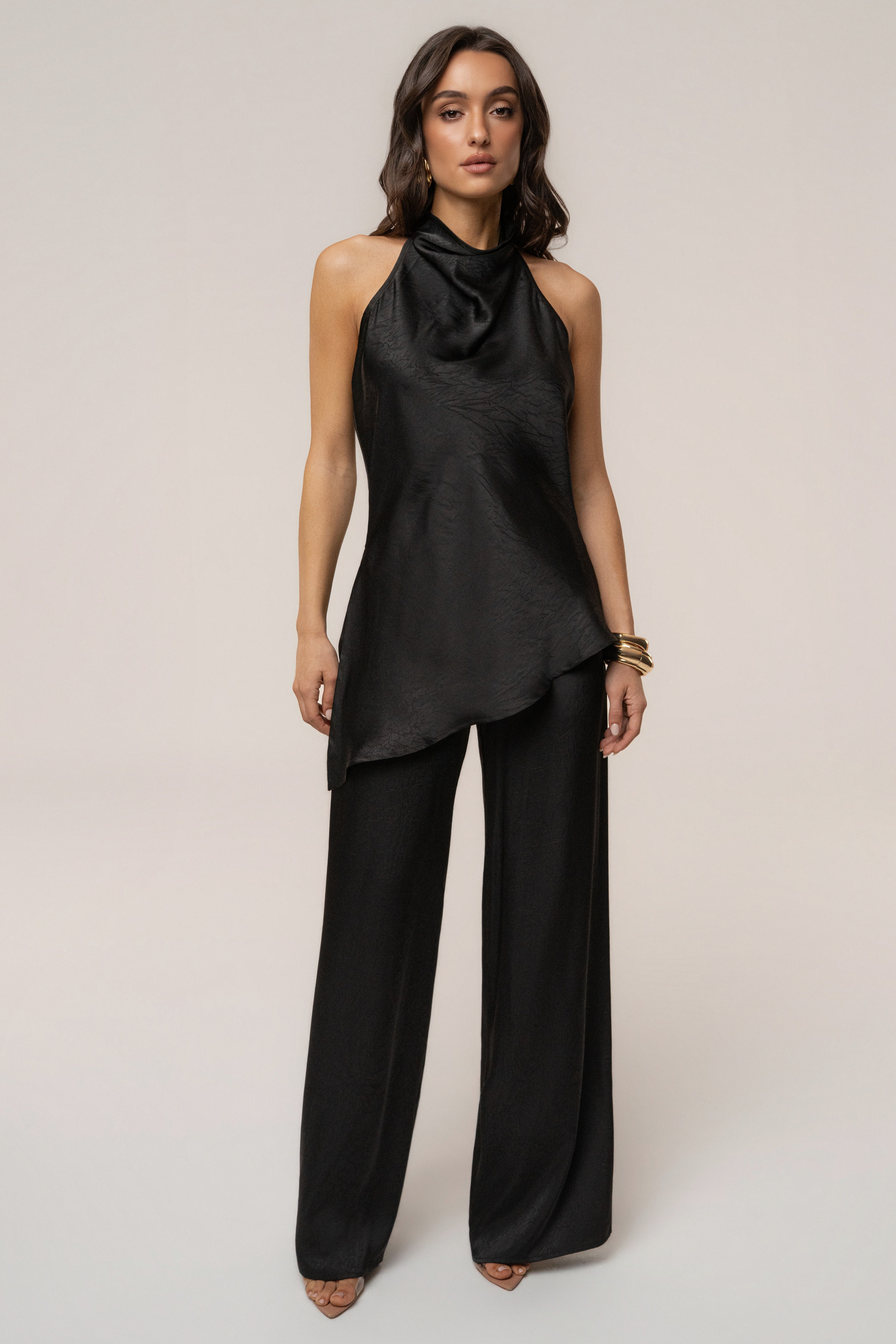Black satin pant set with draped design from JLUXLABEL, featuring a stylish, flowy top and matching wide-leg pants.