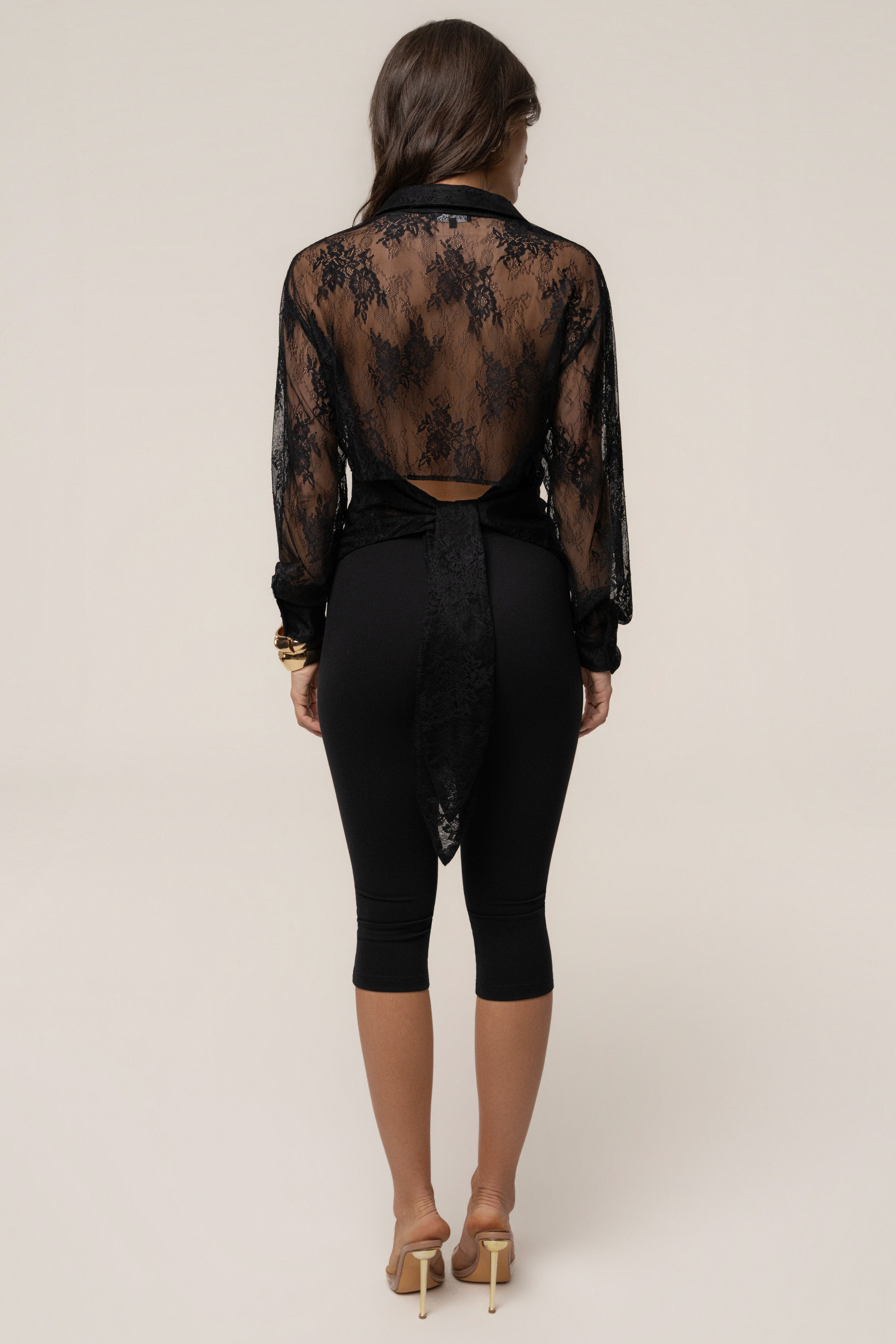 Black tailored lace button-up blouse from JLUXLABEL, featuring a classic collar and intricate lace details, perfect for elegant tops.
