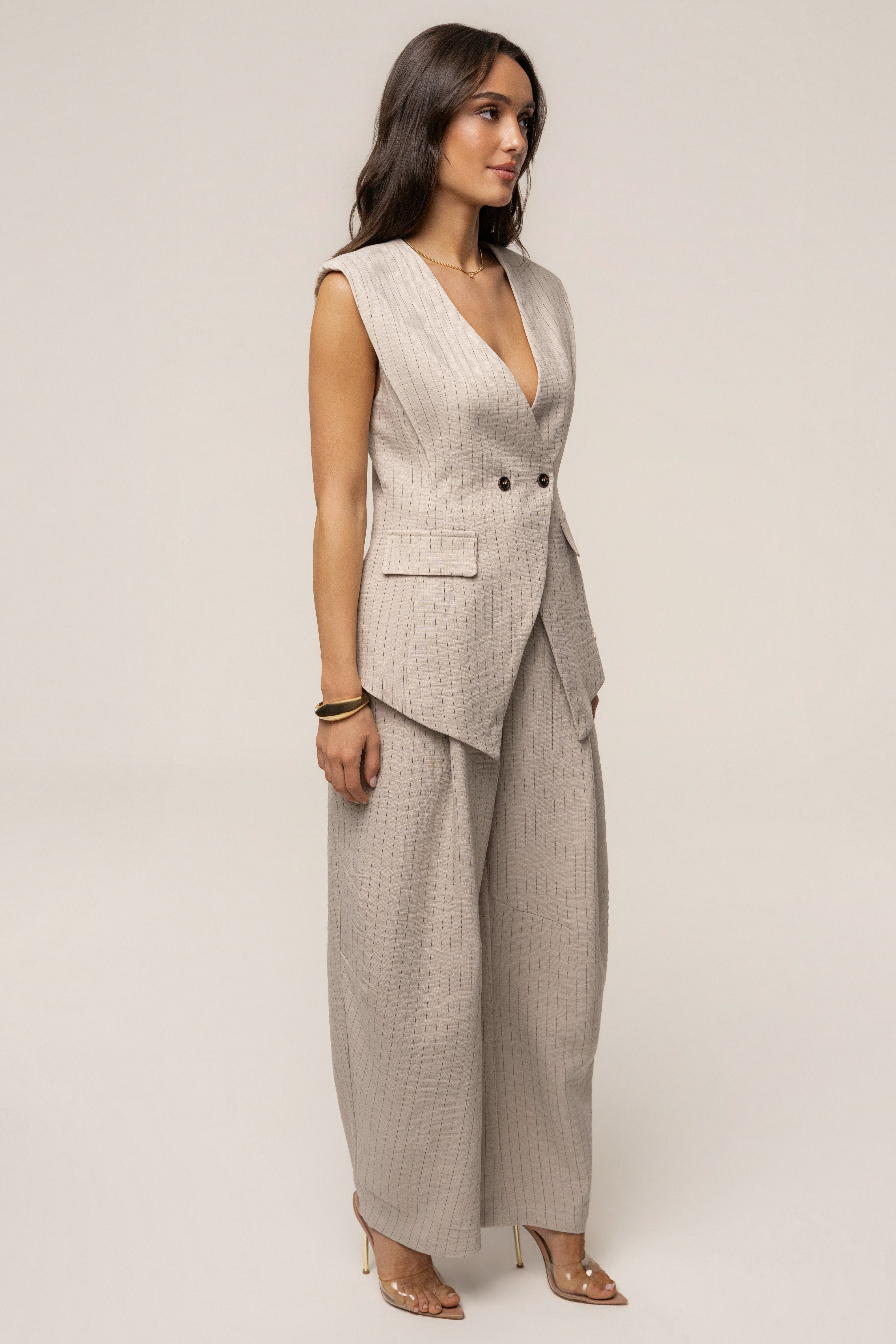 Beige JLUXLABEL power pinstripe pant set featuring a tailored blazer and matching wide-leg trousers.