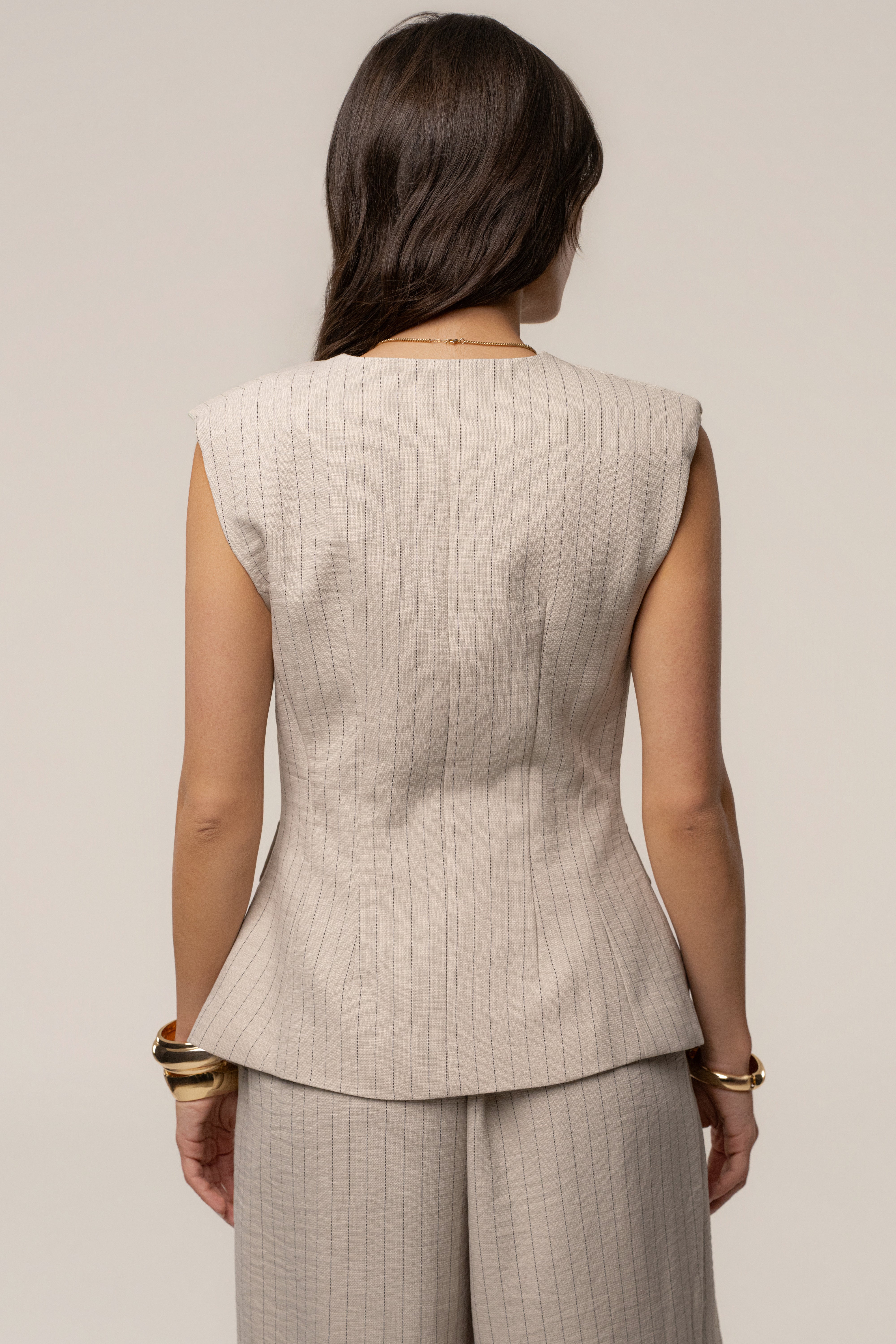 Beige JLUXLABEL power pinstripe pant set featuring a tailored blazer and matching wide-leg trousers.