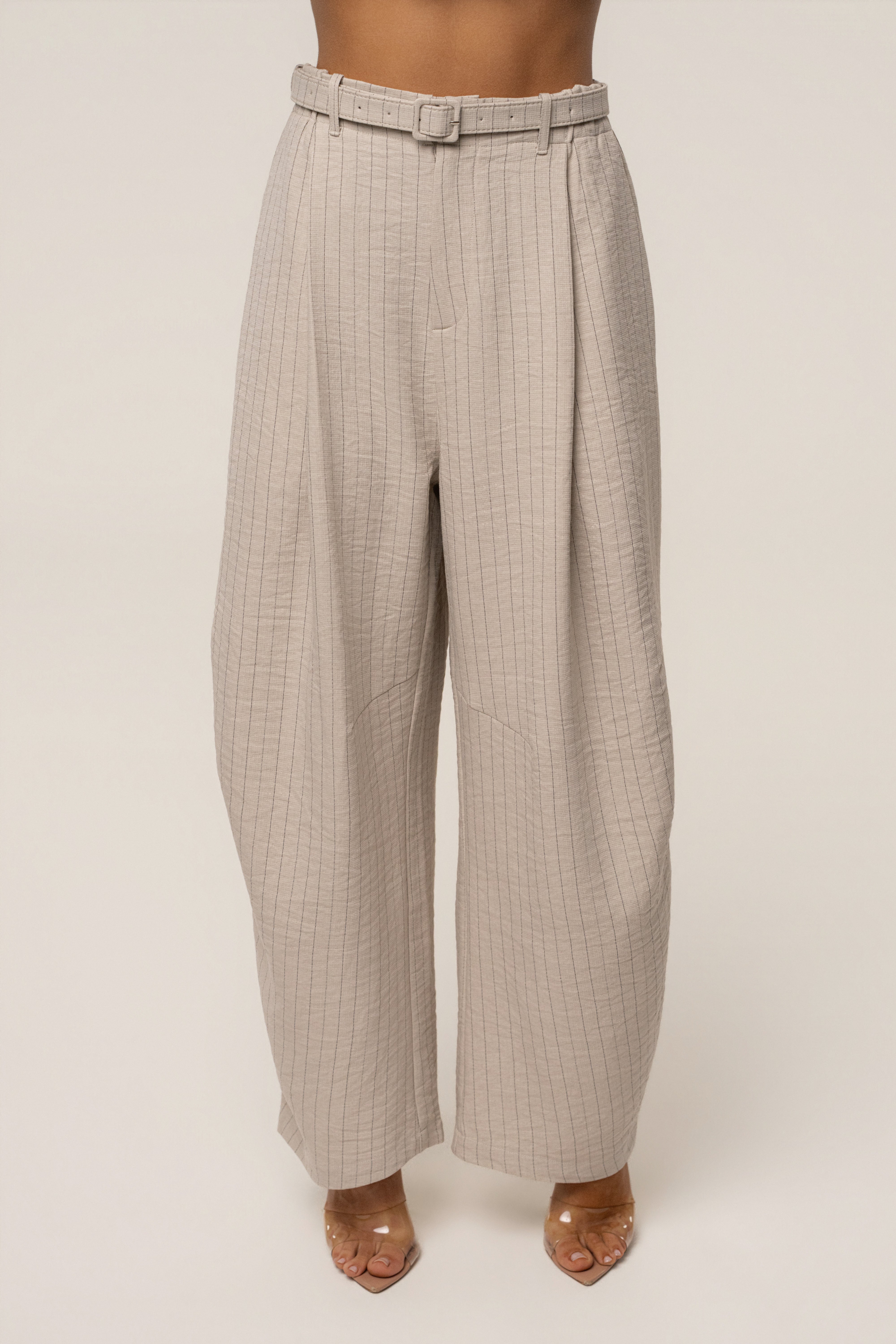 Beige power pinstripe pant set by JLUXLABEL featuring tailored high-waisted pants and a matching blazer for a sophisticated look.