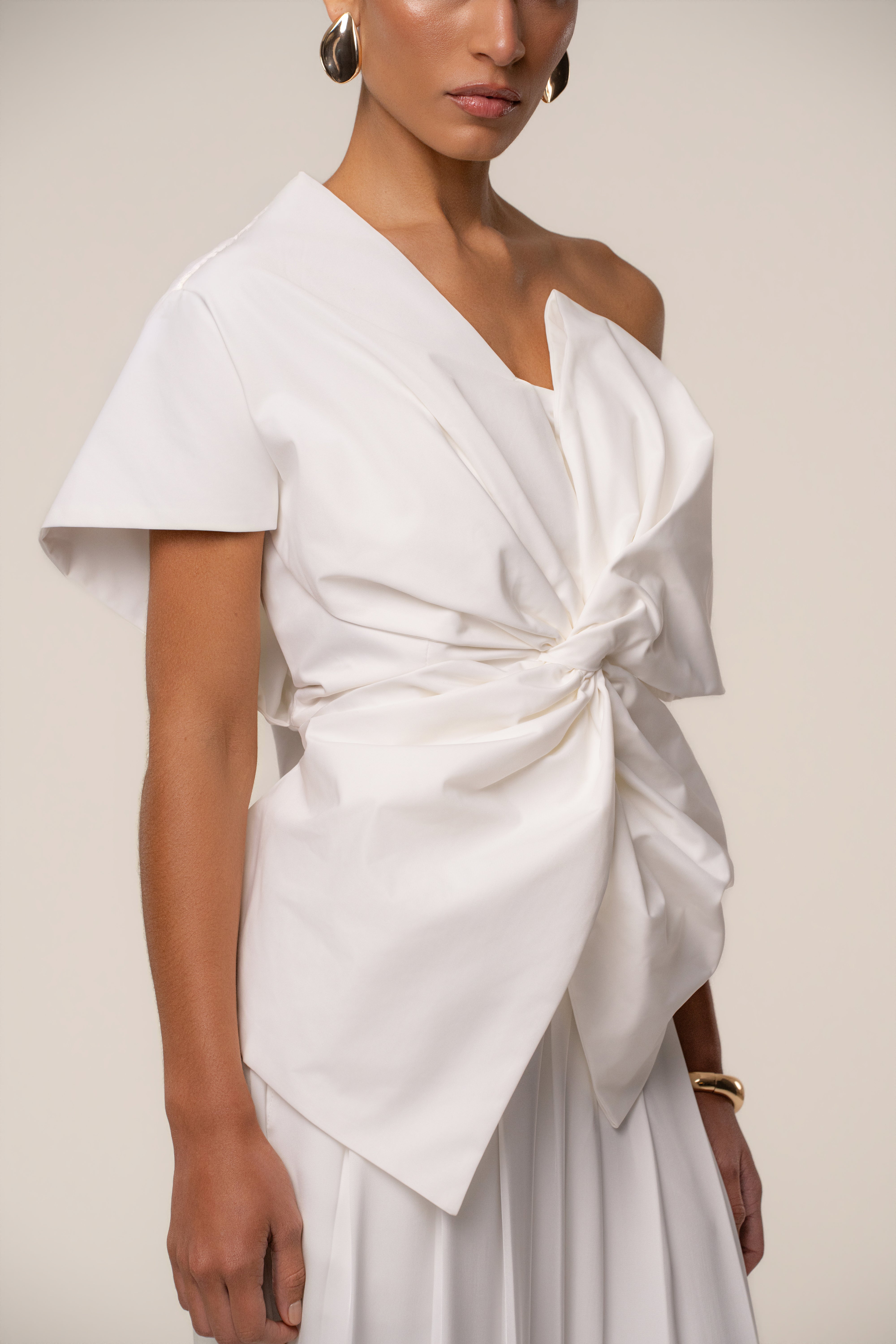 White JLUXLABEL art-inspired blouse, stylish top with a modern design, displayed on a neutral background.