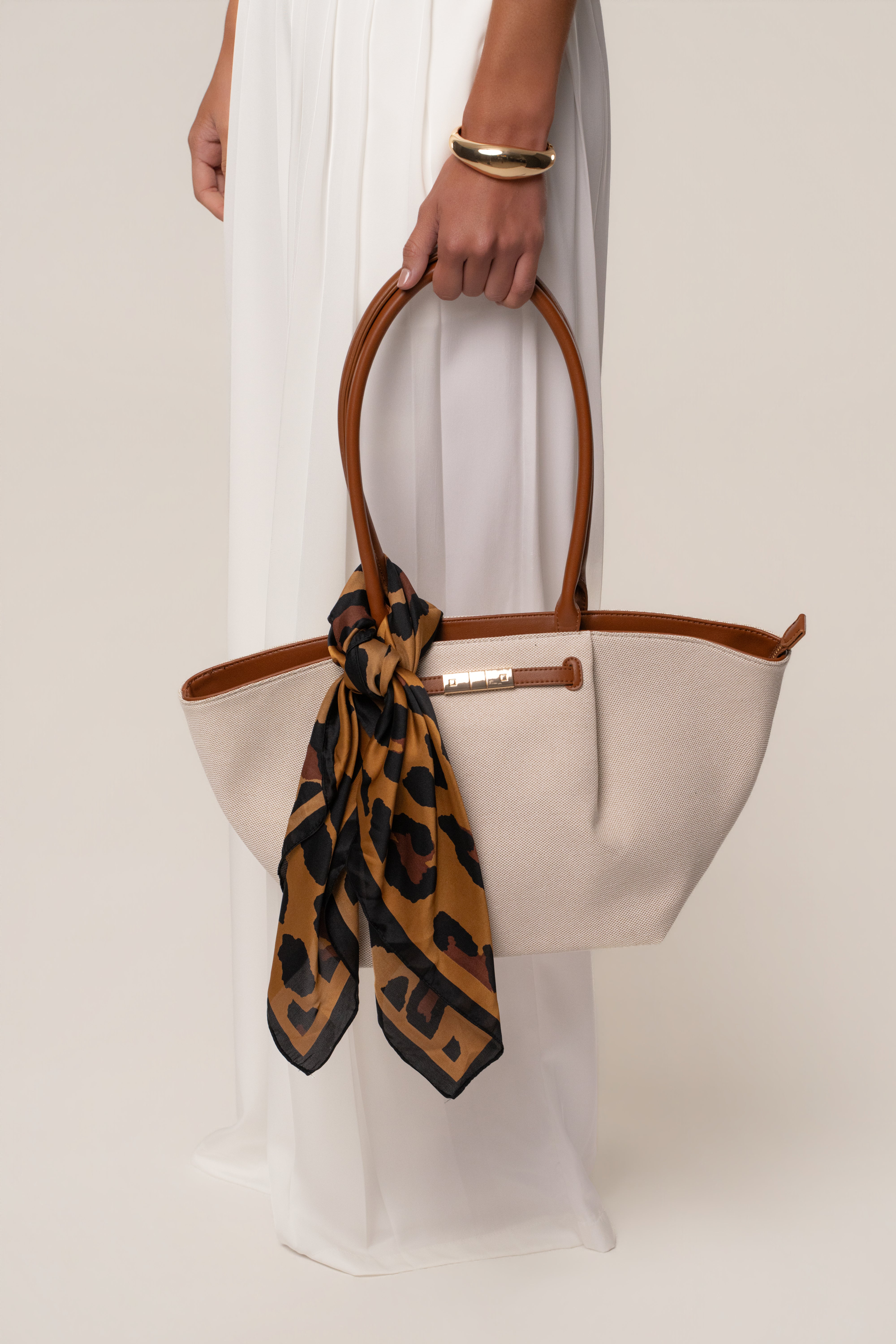 Brown Bold Nature scarf from JLUXLABEL, showcasing its stylish pattern and soft fabric, perfect as a versatile accessories piece.
