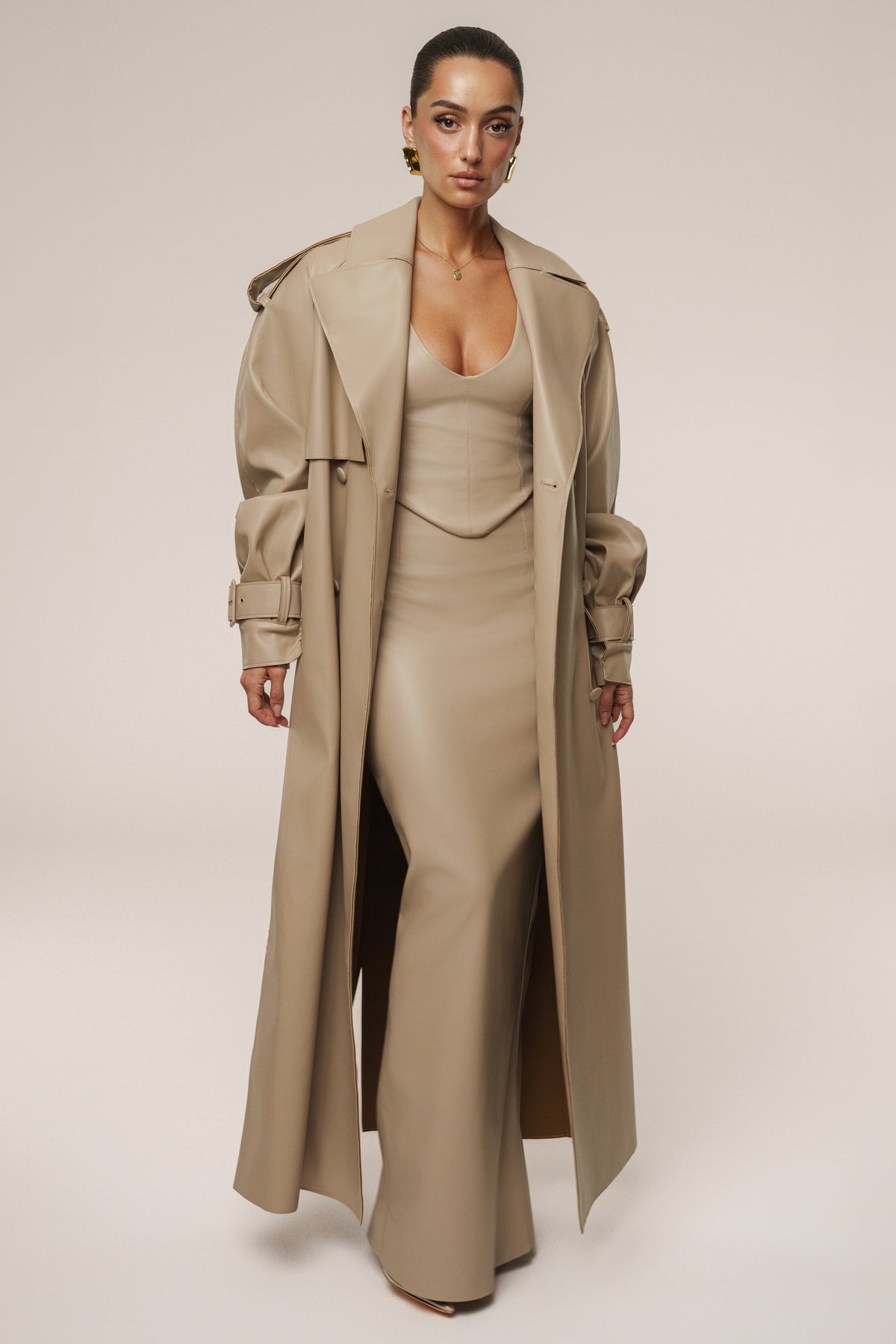 Tan JLUXLABEL The Icon PU leather coat, stylish outerwear with a sleek design, shown on a model.
