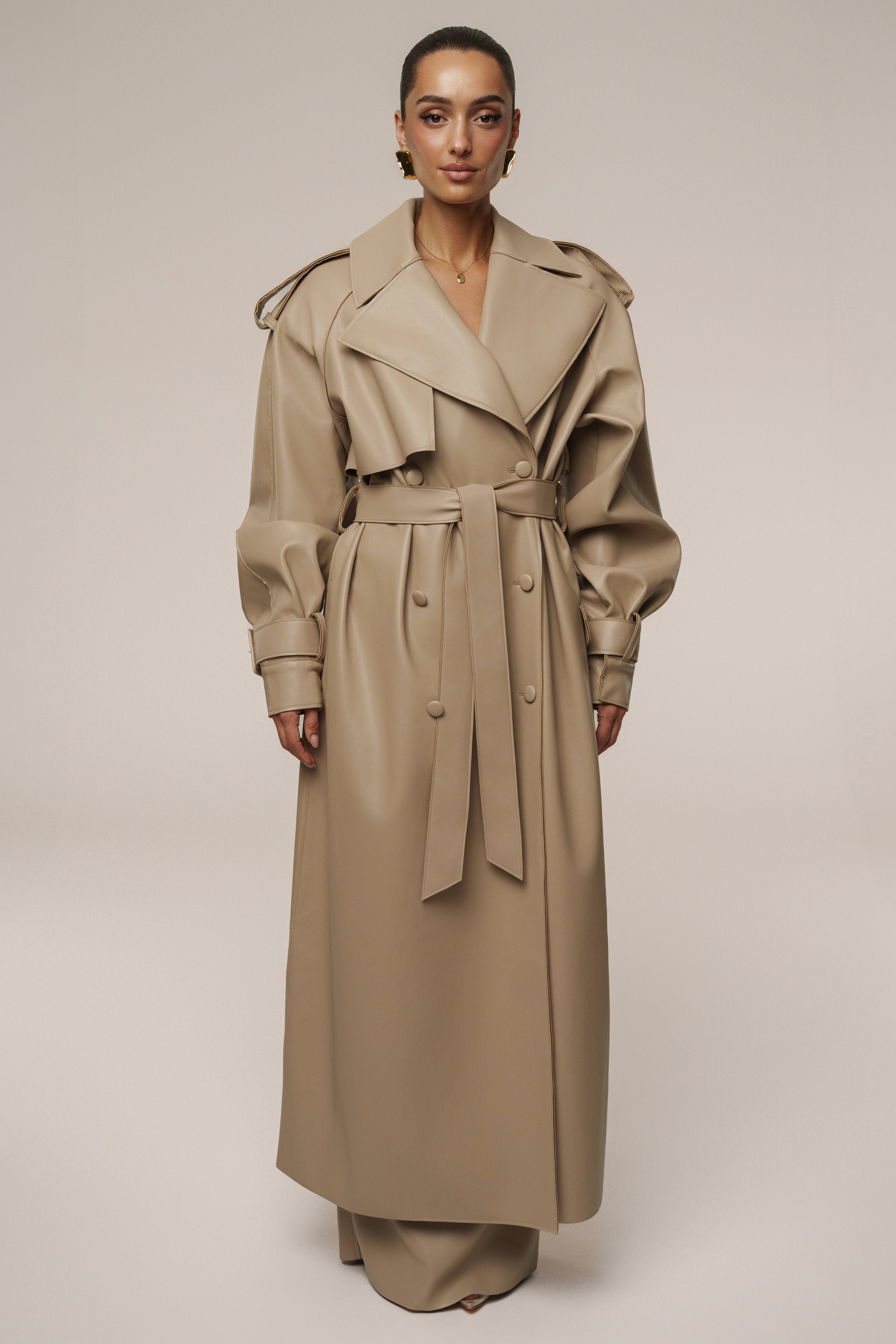 Tan JLUXLABEL Icon PU leather coat, stylish outerwear with a sleek design and classic silhouette, shown on a model.