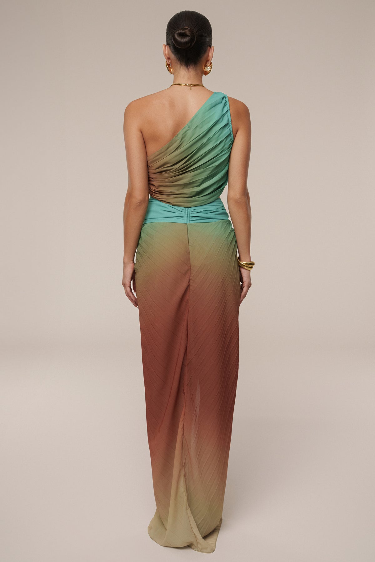 Mint Havana pleated skirt set by JLUXLABEL featuring a high-waisted skirt and matching top, styled for a chic, coordinated look.