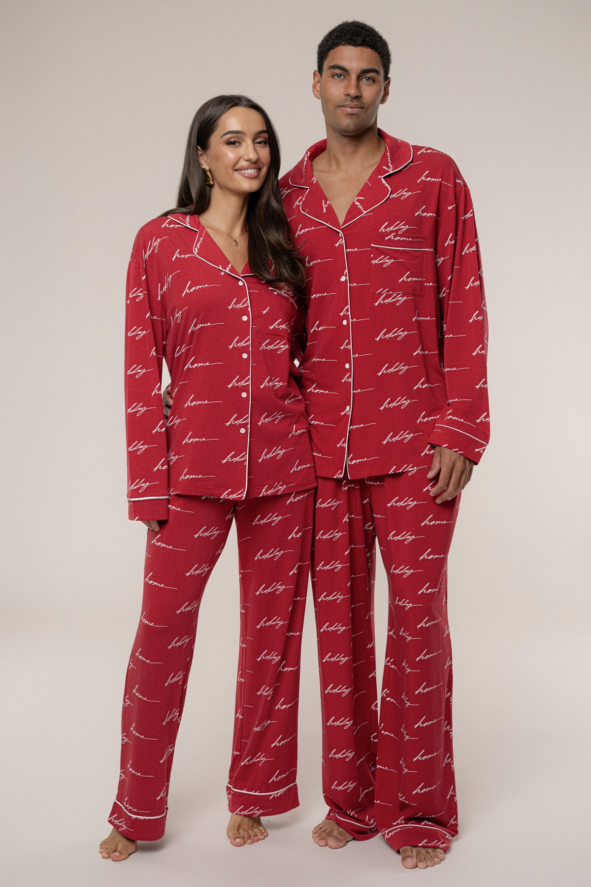 Red holiday-themed adult pajama set by JLUXLABEL featuring festive "Home For The Holidays" design, comfortable and cozy.
