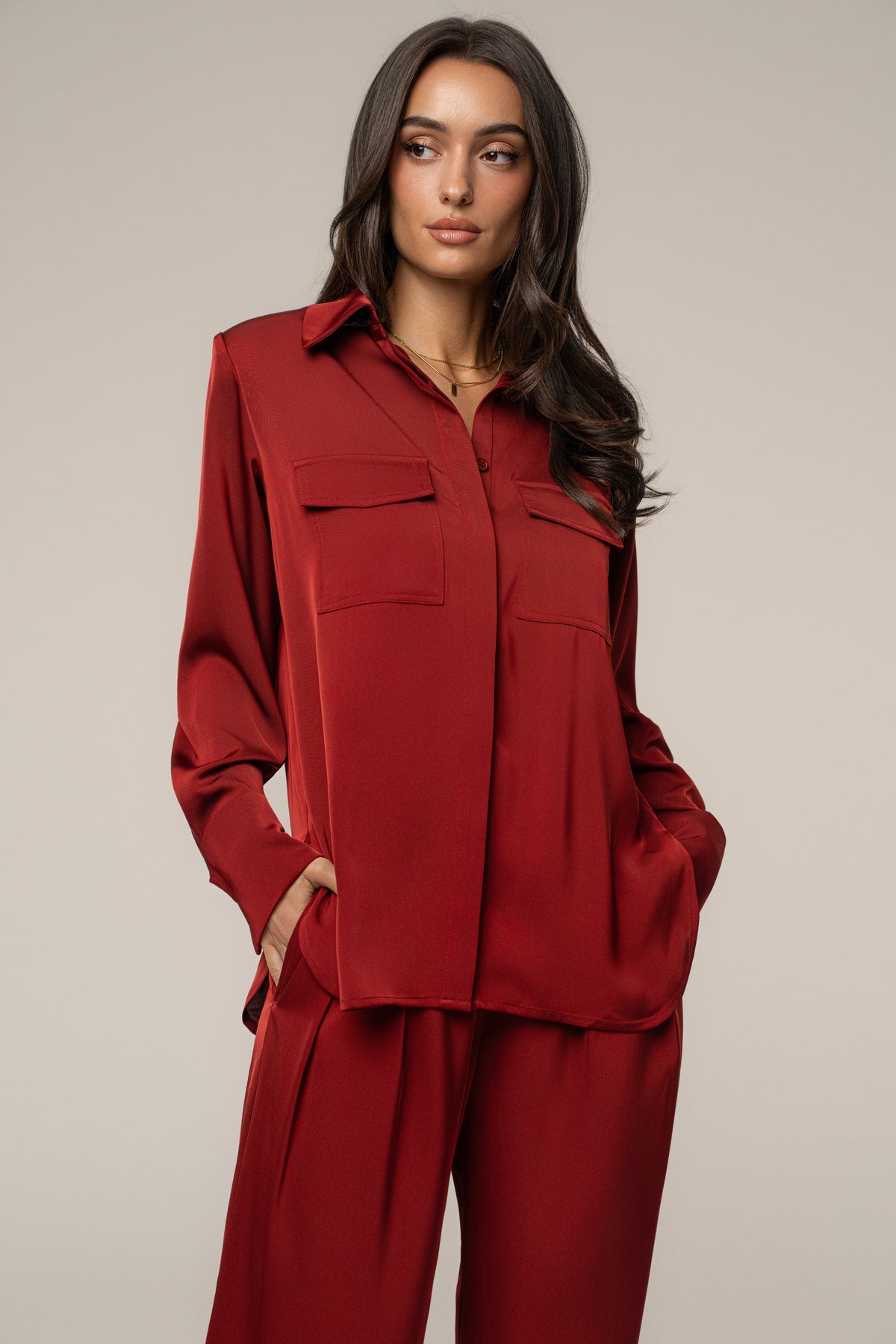 Burgundy Misty button-up top by JLUXLABEL with long sleeves and collared neckline, displayed on a hanger.