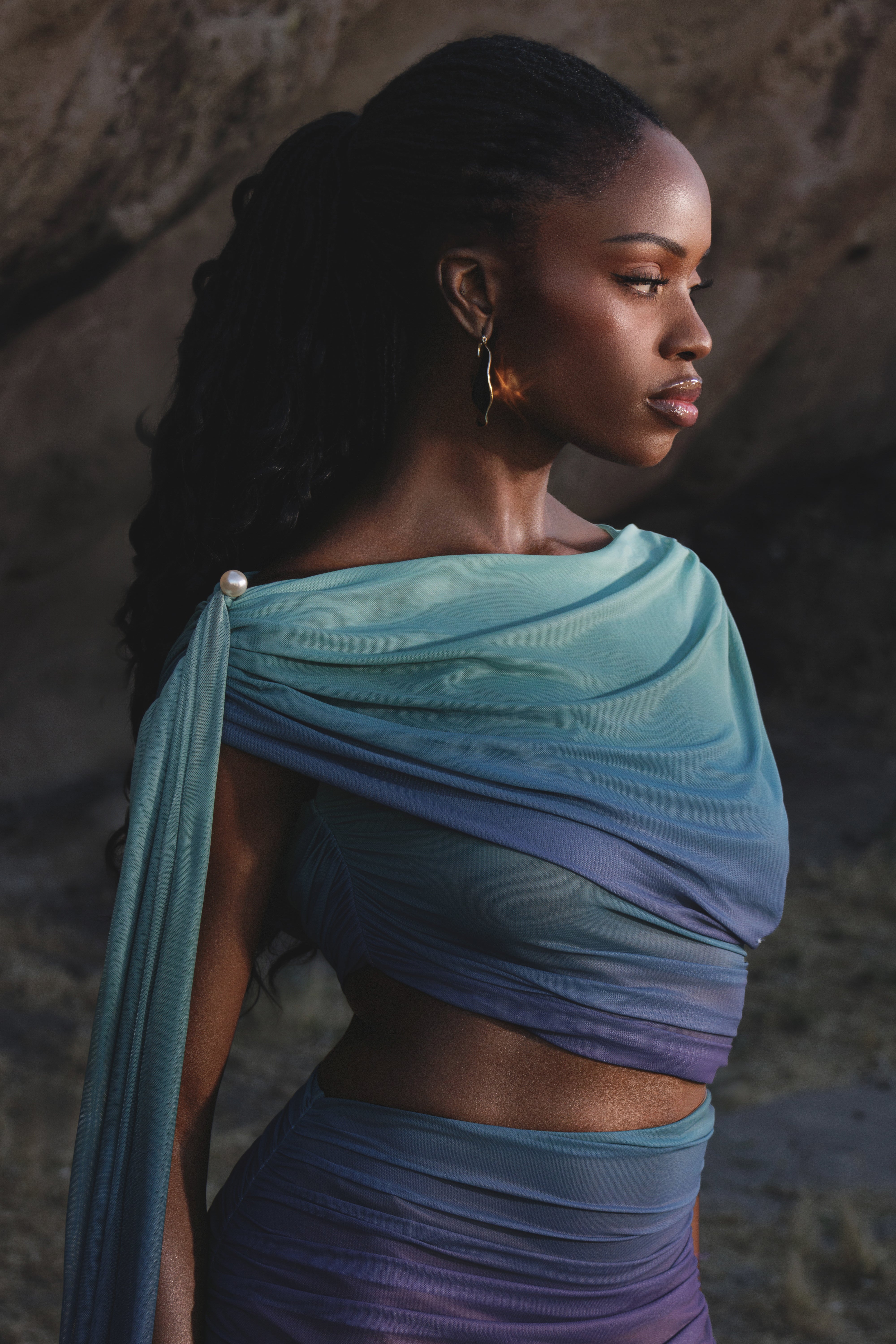 Lunar Shadow Aris cutout midi dress by JLUXLABEL featuring a stylish silhouette and elegant design, shown on a model.